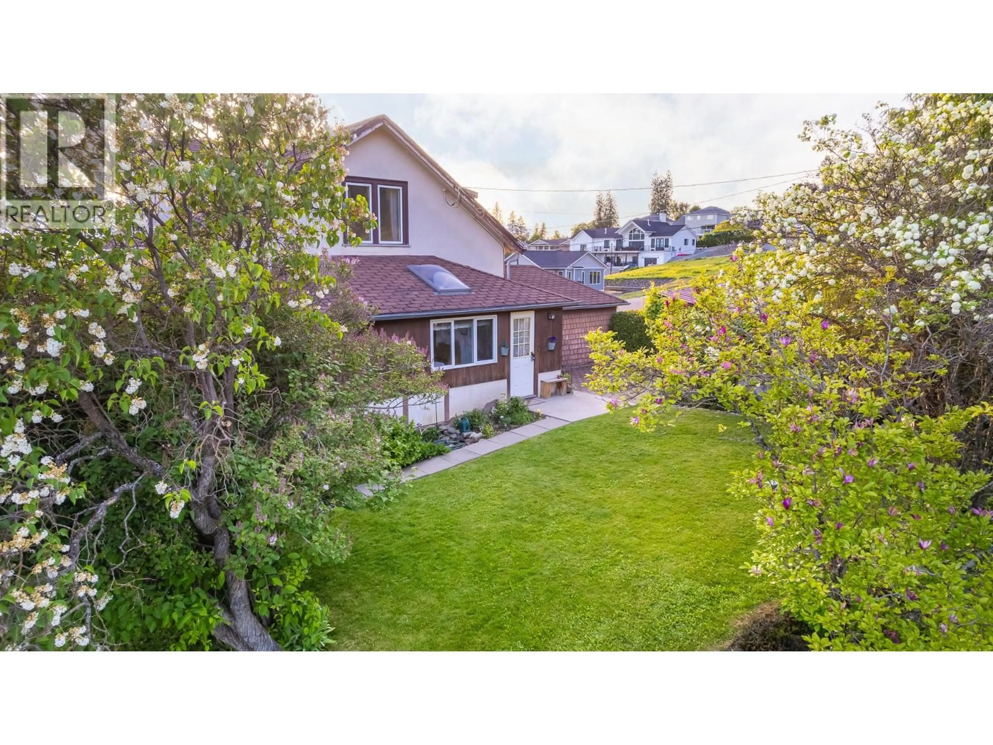 A pic from outside/outdoor area/front of a property/back of a property/a pic from drone, street for 1843 MCLAREN STREET, Creston British Columbia V0B1G5