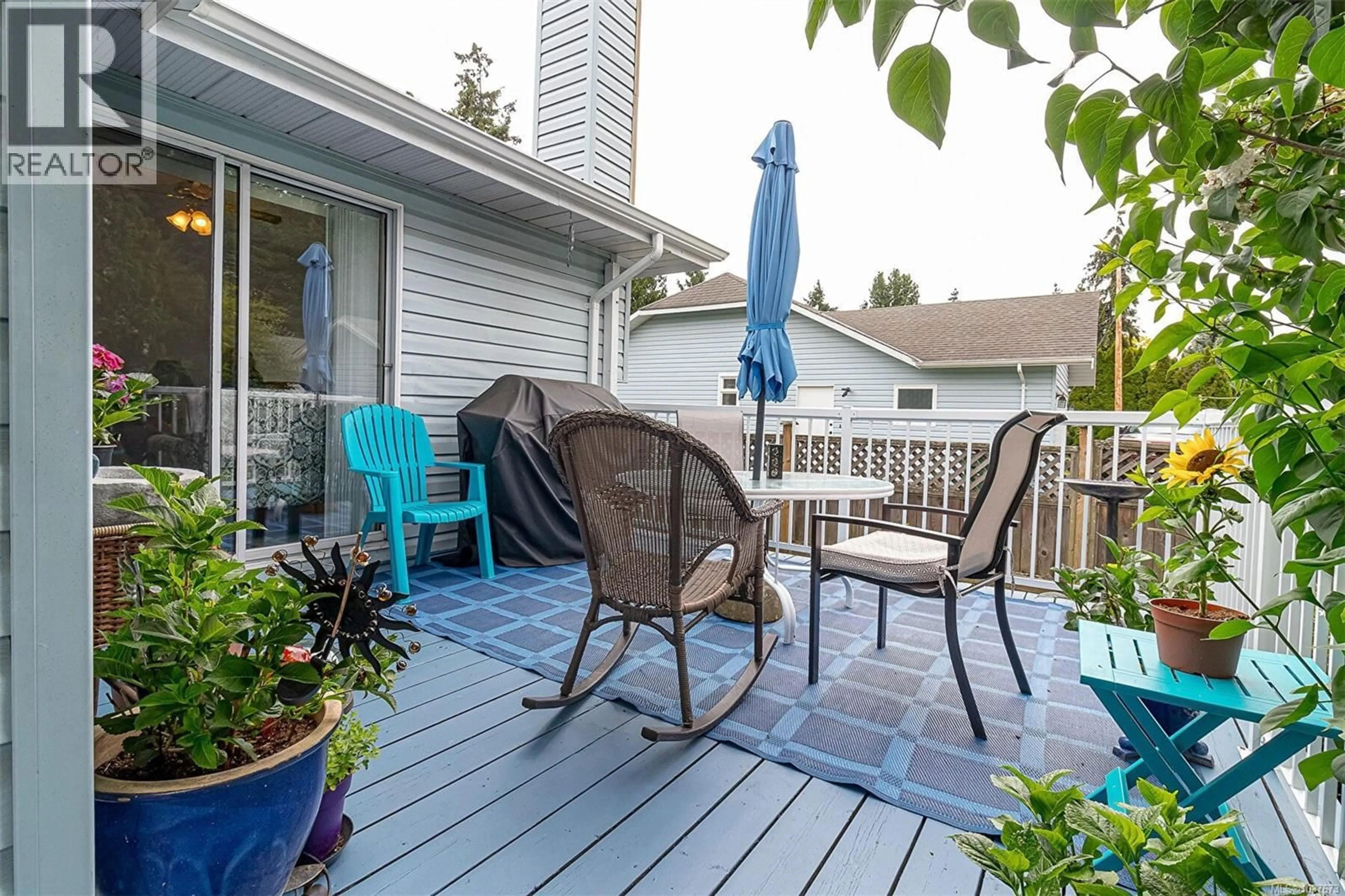Patio, water/lake/river/ocean view for 4573 ELK LAKE DRIVE, Saanich British Columbia V8Z6L3