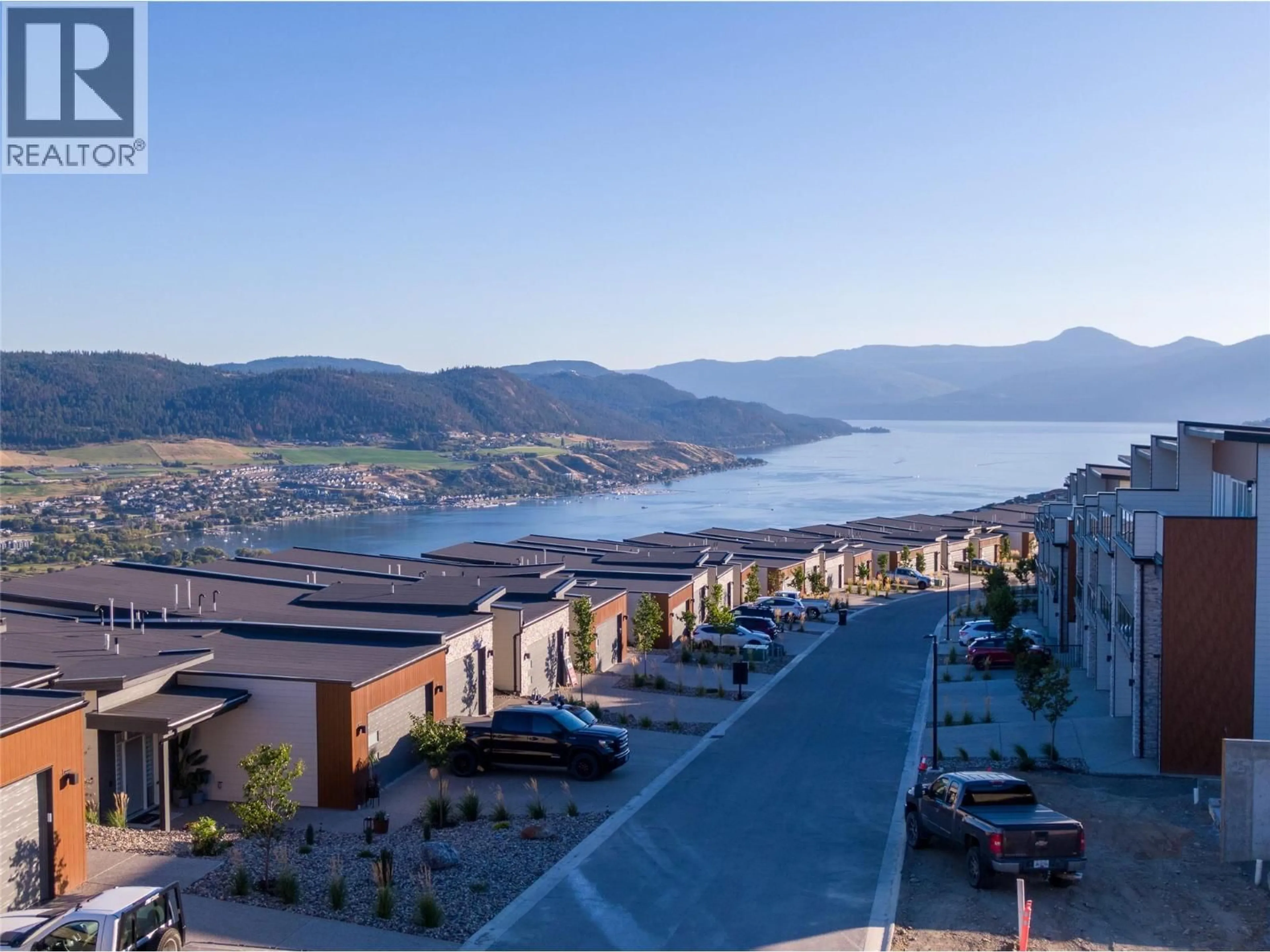 A pic from outside/outdoor area/front of a property/back of a property/a pic from drone, mountain view for 66 - 7735 OKANAGAN HILLS BOULEVARD, Vernon British Columbia V1H0A7