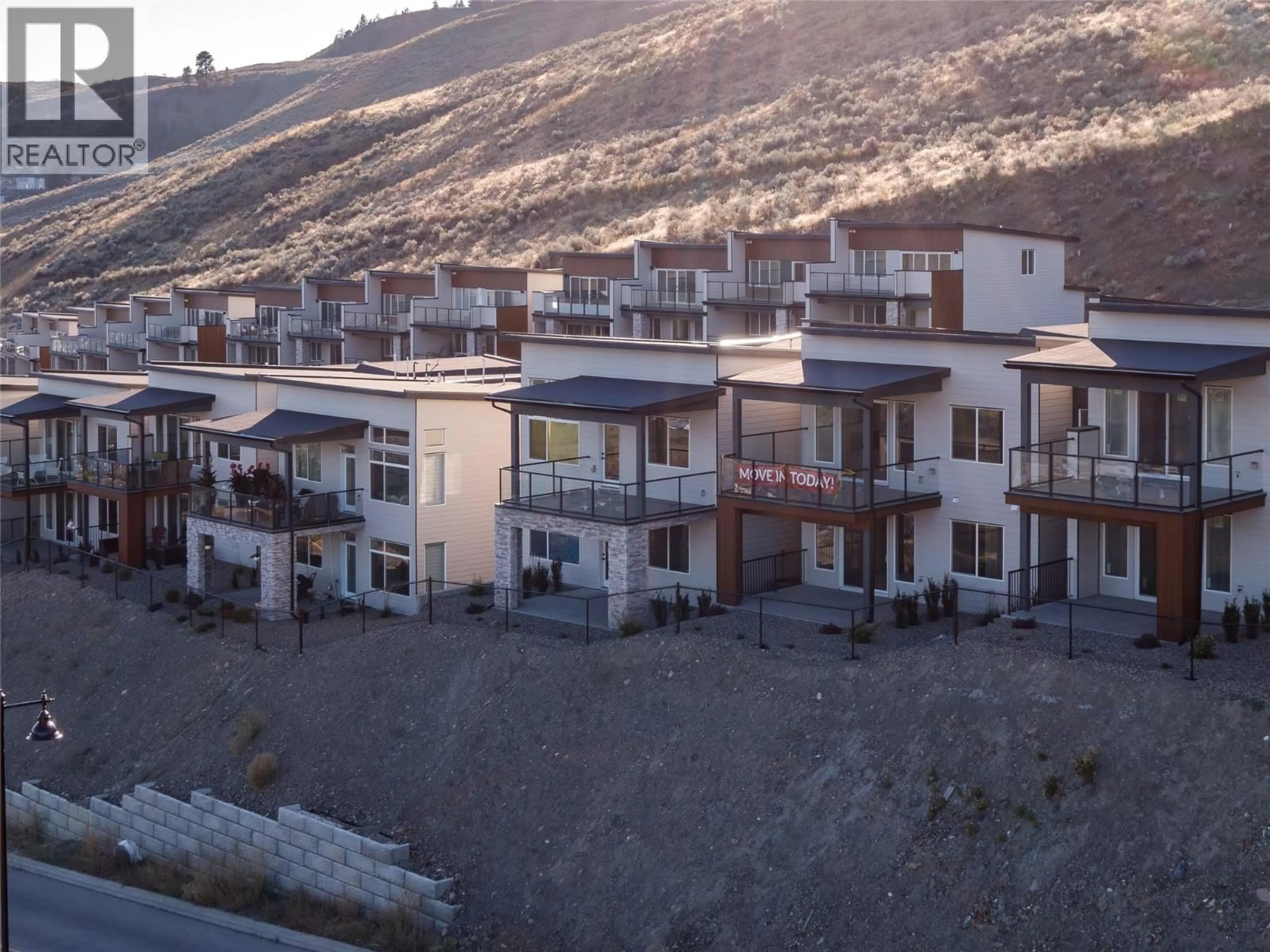 A pic from outside/outdoor area/front of a property/back of a property/a pic from drone, mountain view for 66 - 7735 OKANAGAN HILLS BOULEVARD, Vernon British Columbia V1H0A7
