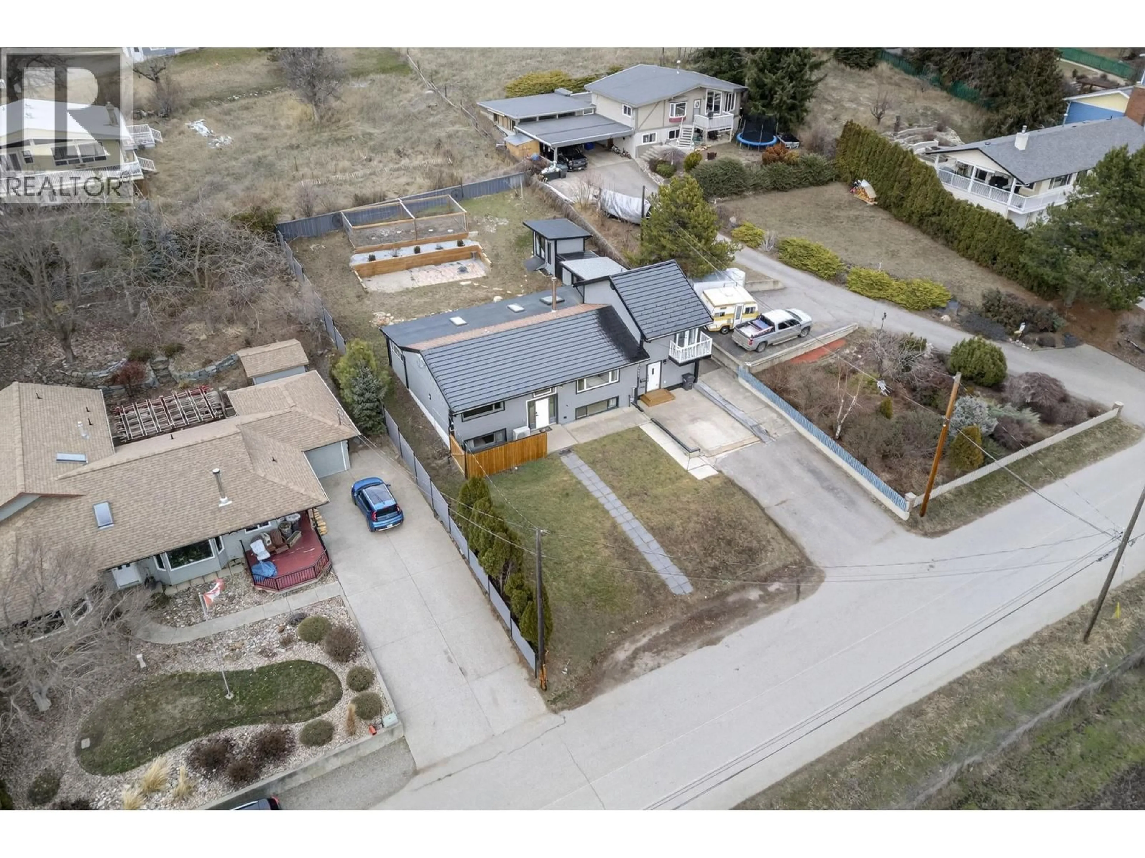 A pic from outside/outdoor area/front of a property/back of a property/a pic from drone, building for 9803 VENABLES DRIVE, Coldstream British Columbia V1B2K1