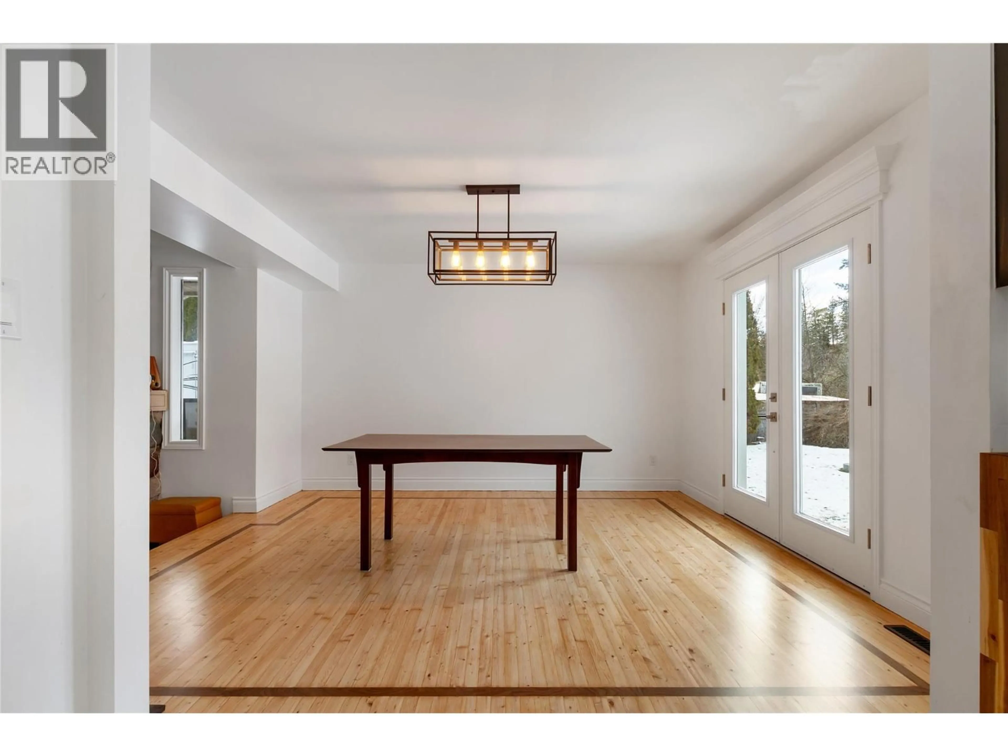 Dining room, wood/laminate floor for 1065 BX ROAD, Vernon British Columbia V1B3K2