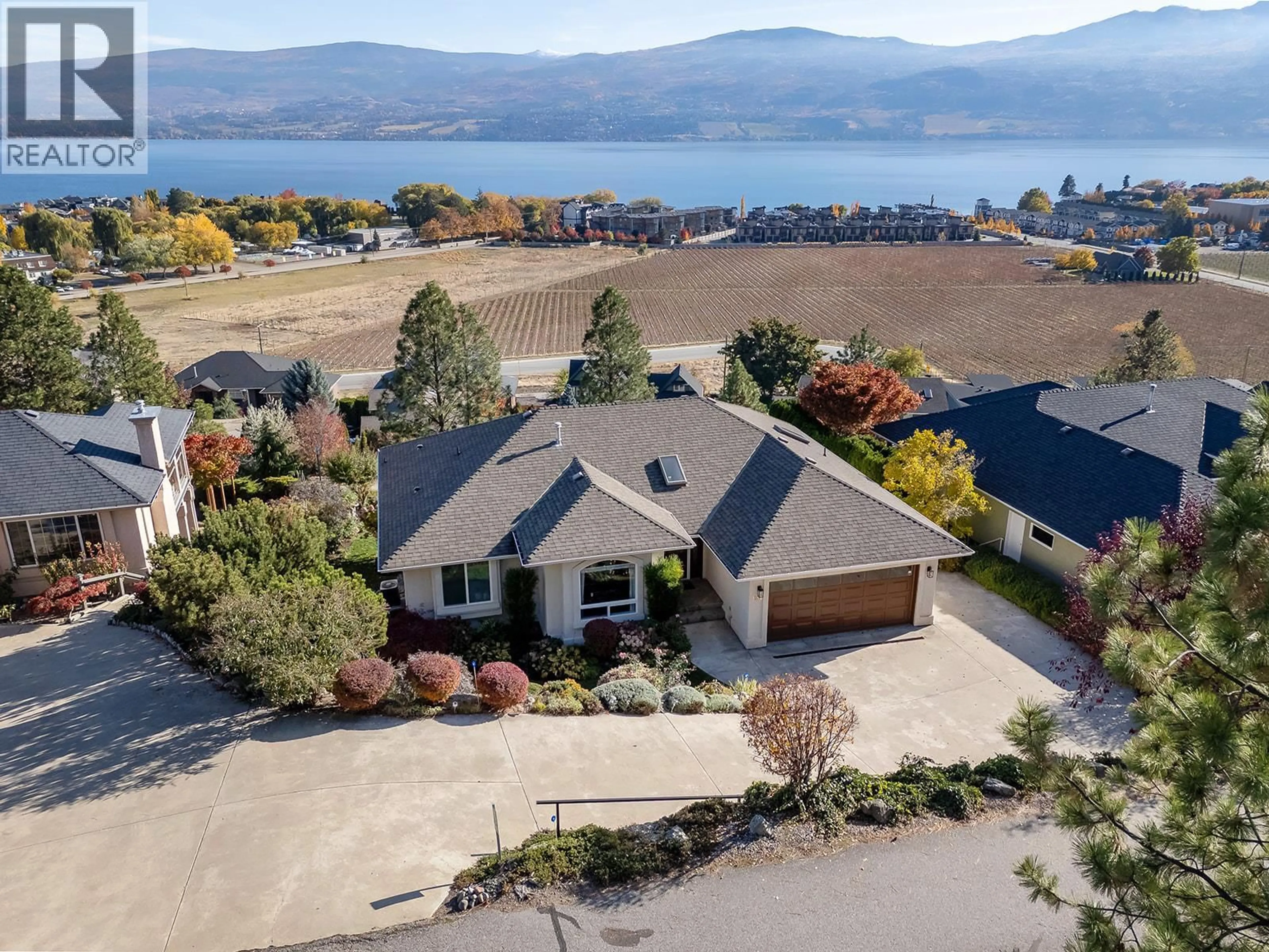 A pic from outside/outdoor area/front of a property/back of a property/a pic from drone, water/lake/river/ocean view for 3576 APPLE WAY BOULEVARD, West Kelowna British Columbia V4T1Y7