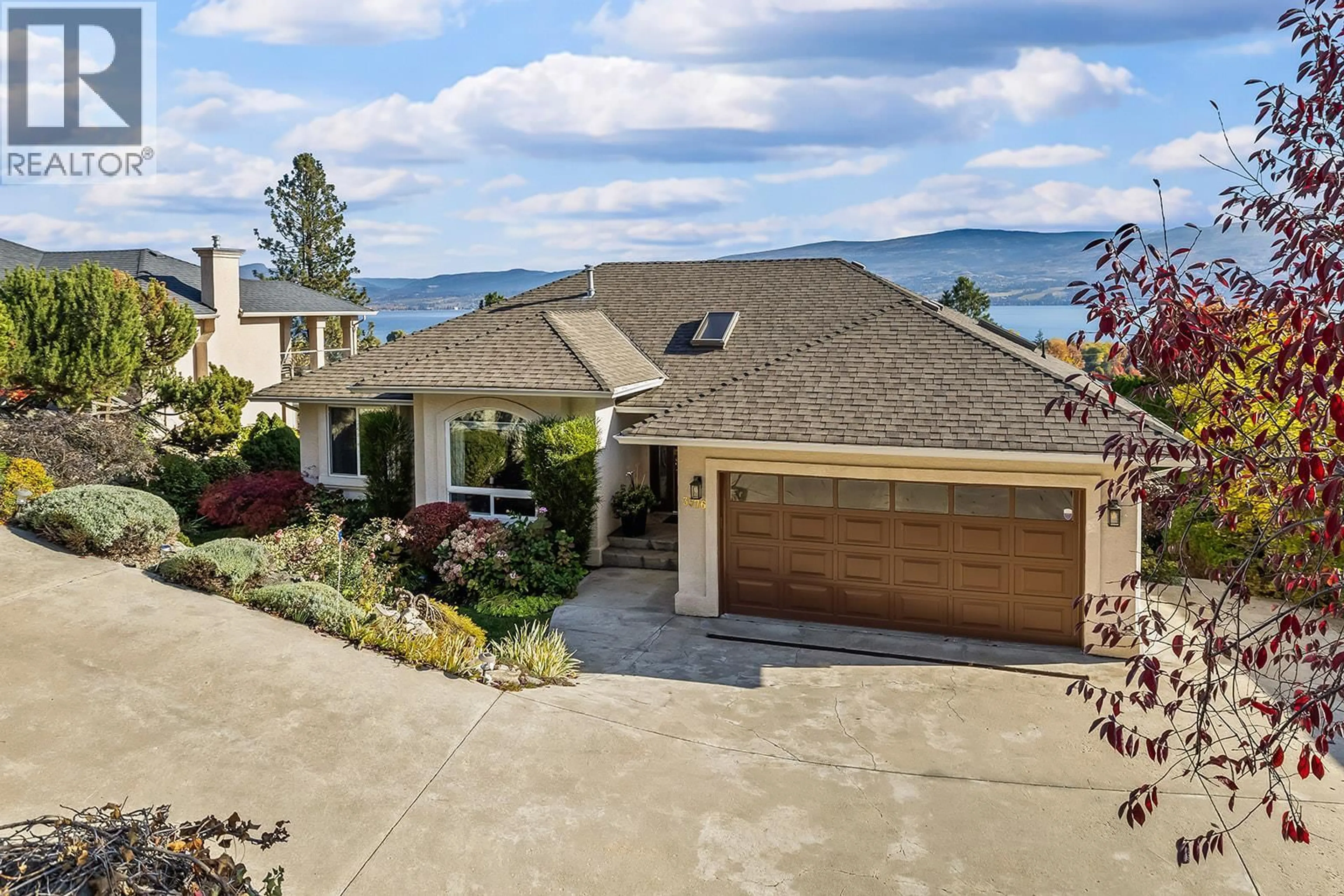 A pic from outside/outdoor area/front of a property/back of a property/a pic from drone, water/lake/river/ocean view for 3576 APPLE WAY BOULEVARD, West Kelowna British Columbia V4T1Y7