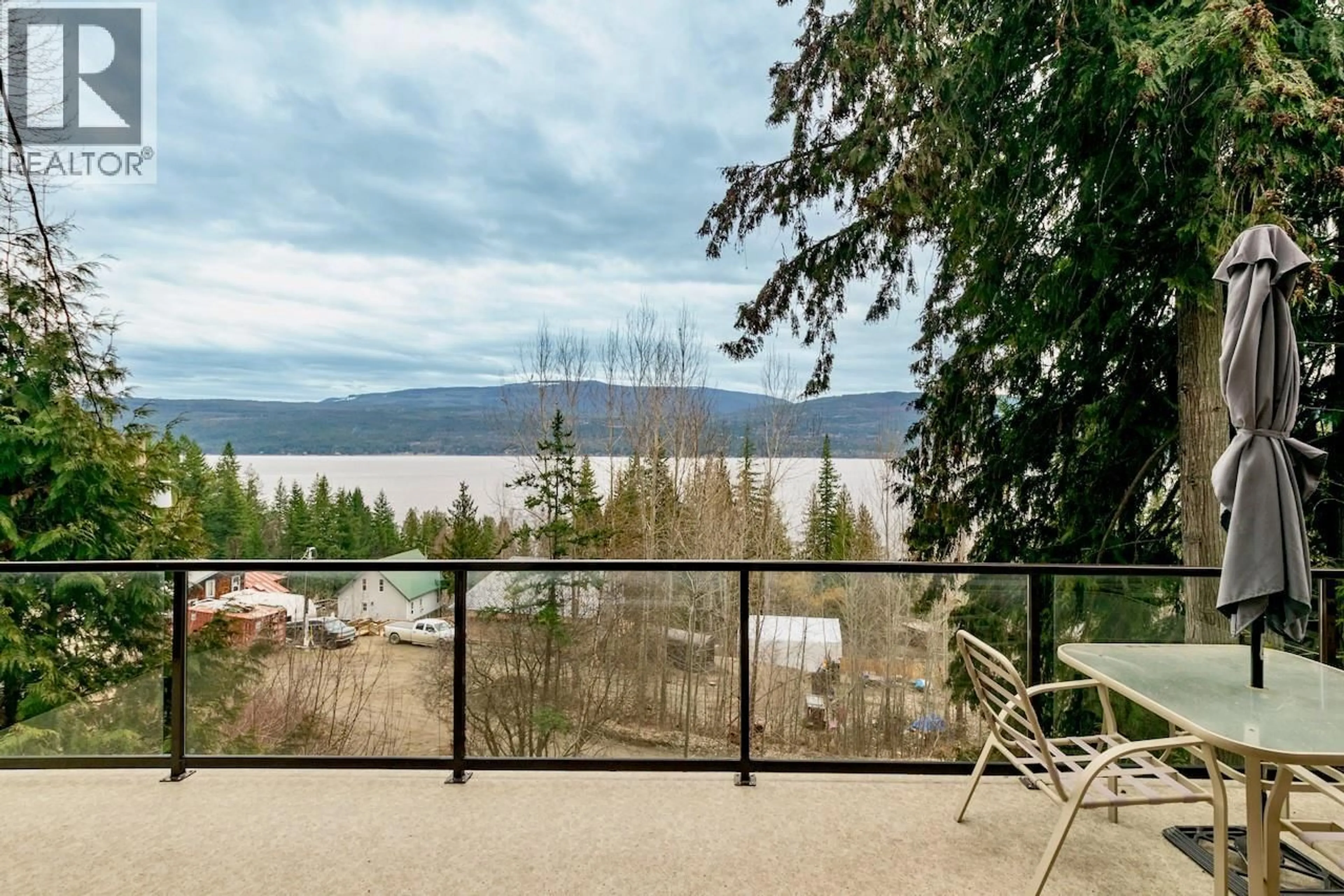 Patio, water/lake/river/ocean view for 7547 GOLDEN SPUR TRAIL, Anglemont British Columbia V0E1M8