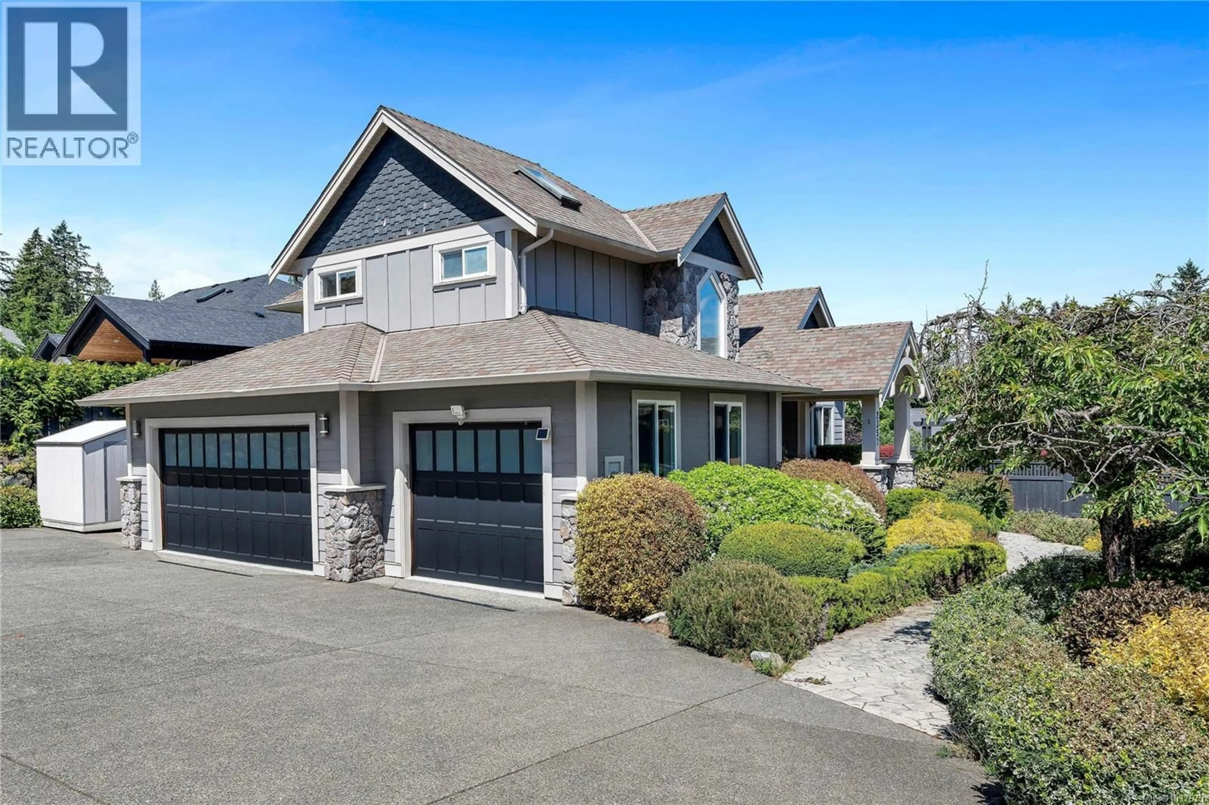 Home with vinyl exterior material, street for 2357 COOPERS HAWK RISE, Mill Bay British Columbia V0R2P4