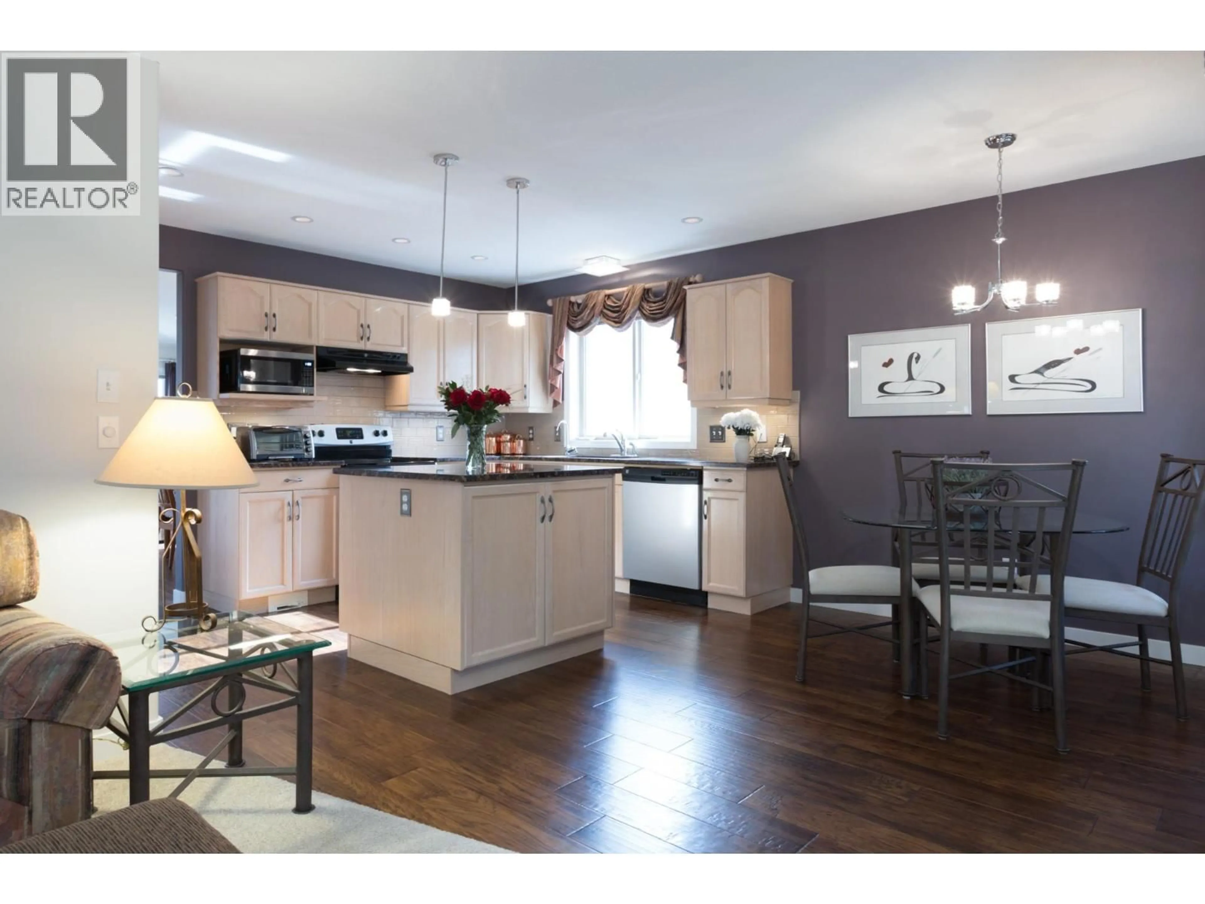 Open concept kitchen, wood/laminate floor for 449 - 2330 BUTT ROAD, West Kelowna British Columbia V4T2L3