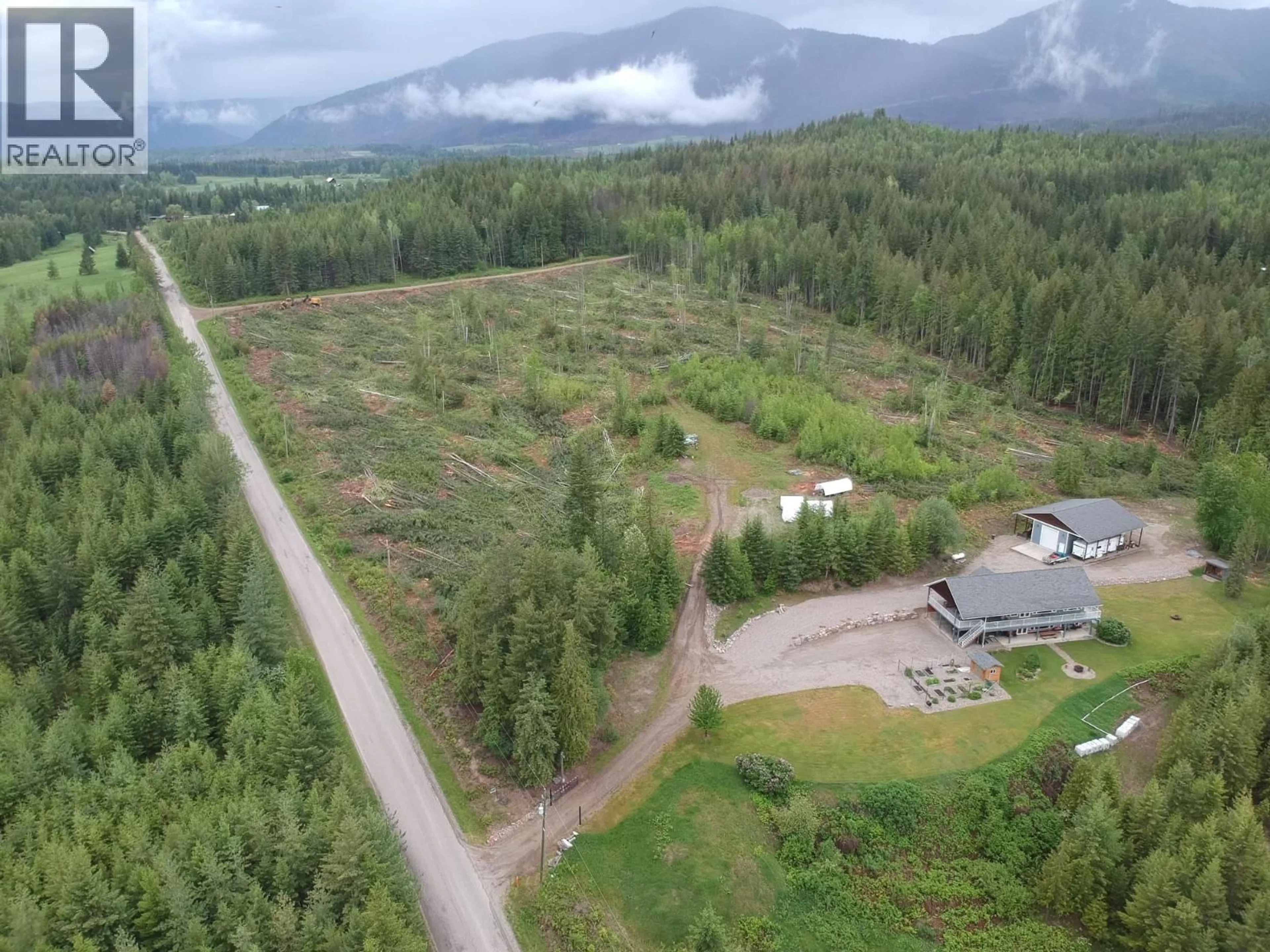 A pic from outside/outdoor area/front of a property/back of a property/a pic from drone, mountain view for 6137 LINE 17 ROAD, Magna Bay British Columbia V0E1L0