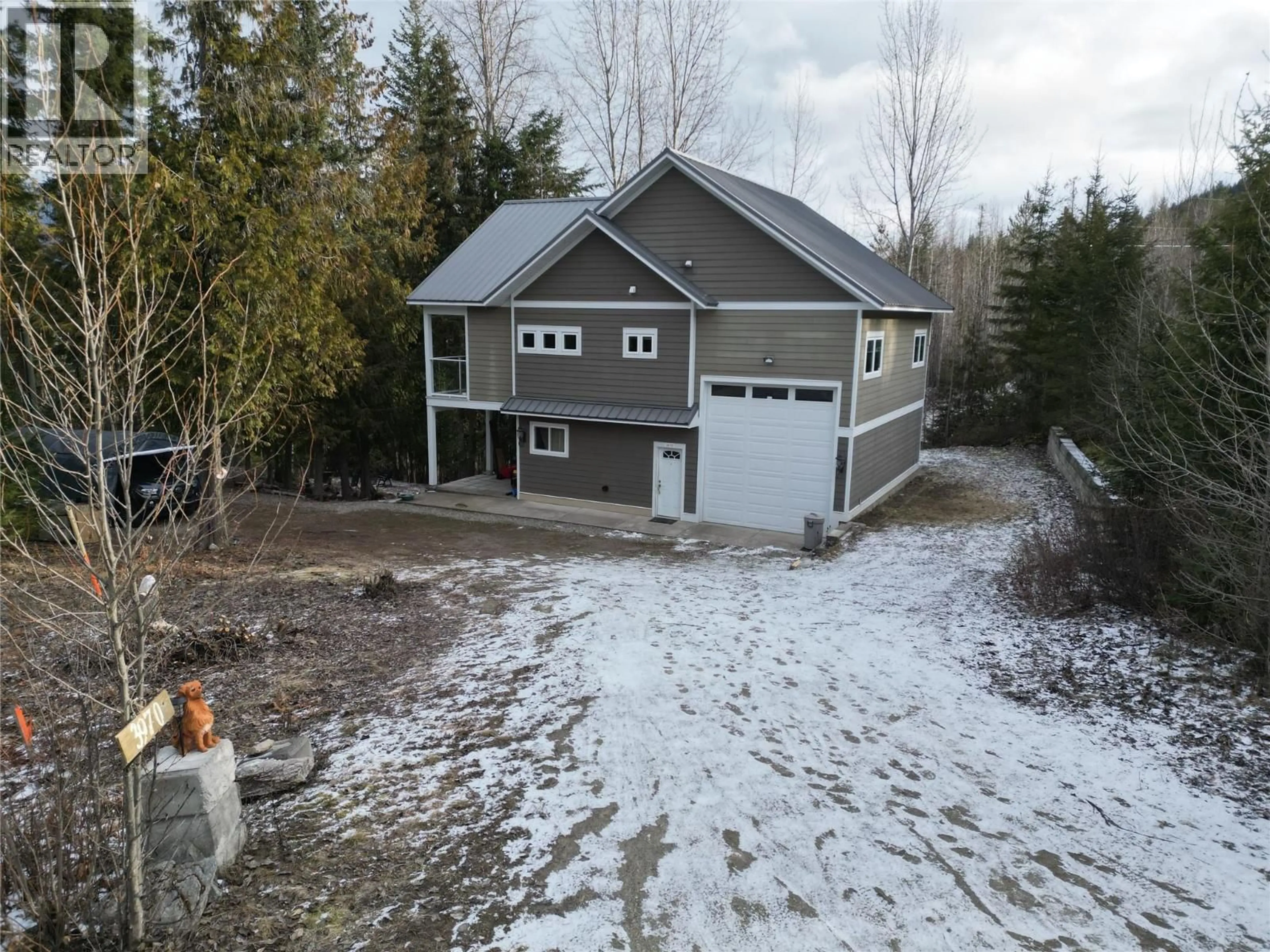 A pic from outside/outdoor area/front of a property/back of a property/a pic from drone, building for 3970 TALIN PLACE, Eagle Bay British Columbia V0E1T0