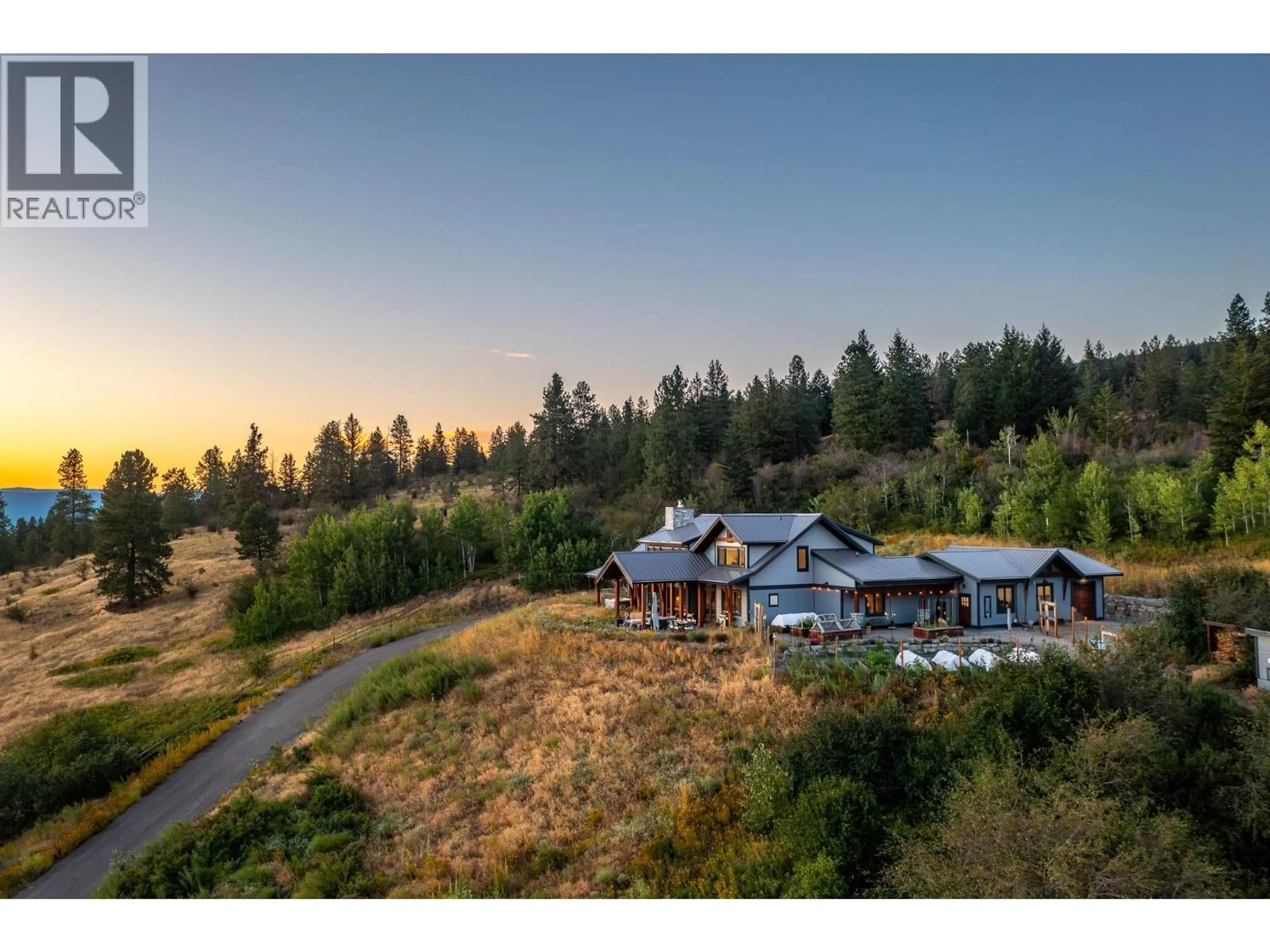 A pic from outside/outdoor area/front of a property/back of a property/a pic from drone, mountain view for 7212 MOUNTRIDGE PLACE, Vernon British Columbia V1B3S8