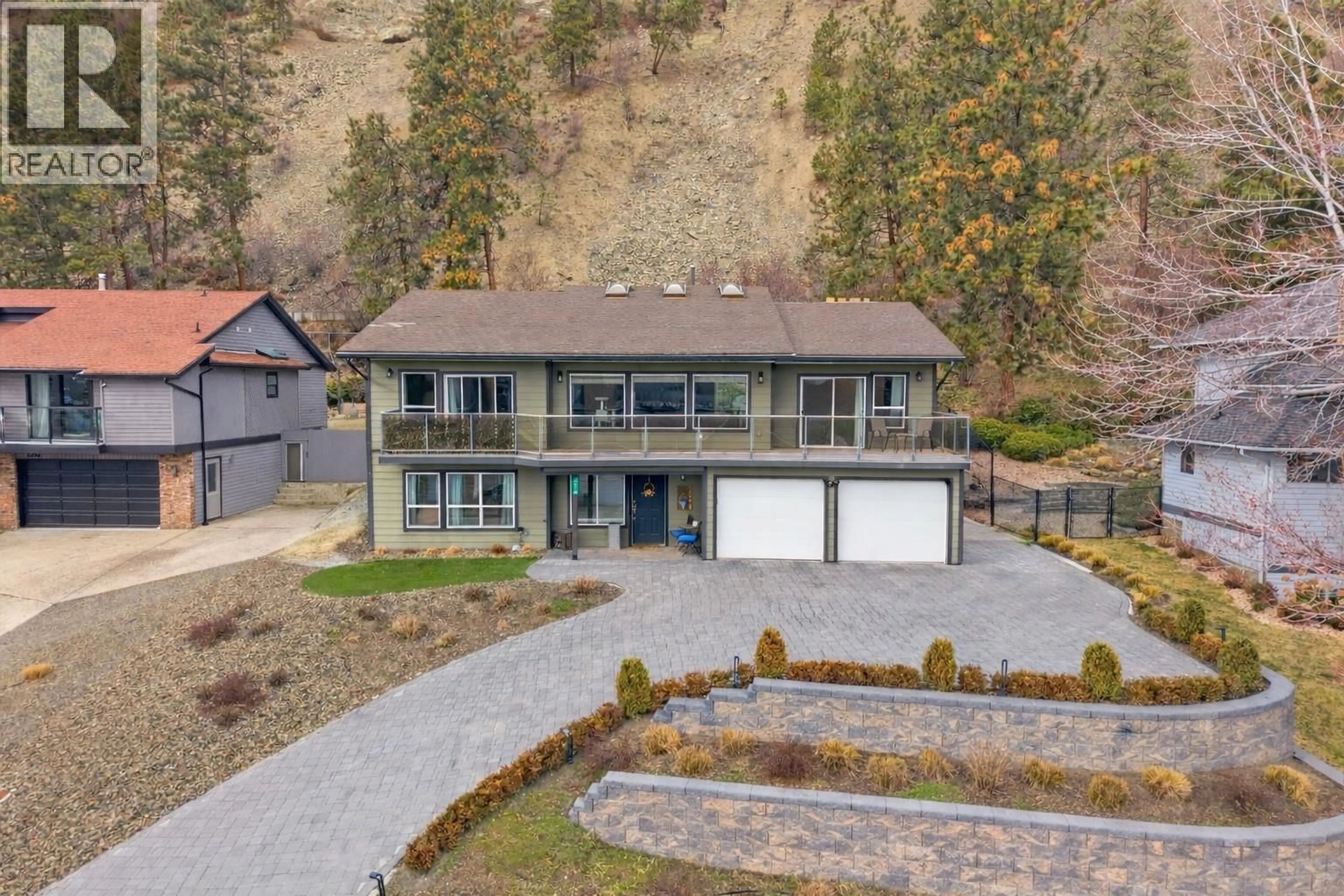 A pic from outside/outdoor area/front of a property/back of a property/a pic from drone, unknown for 2218 OMINECA PLACE, Kelowna British Columbia V1V1H7