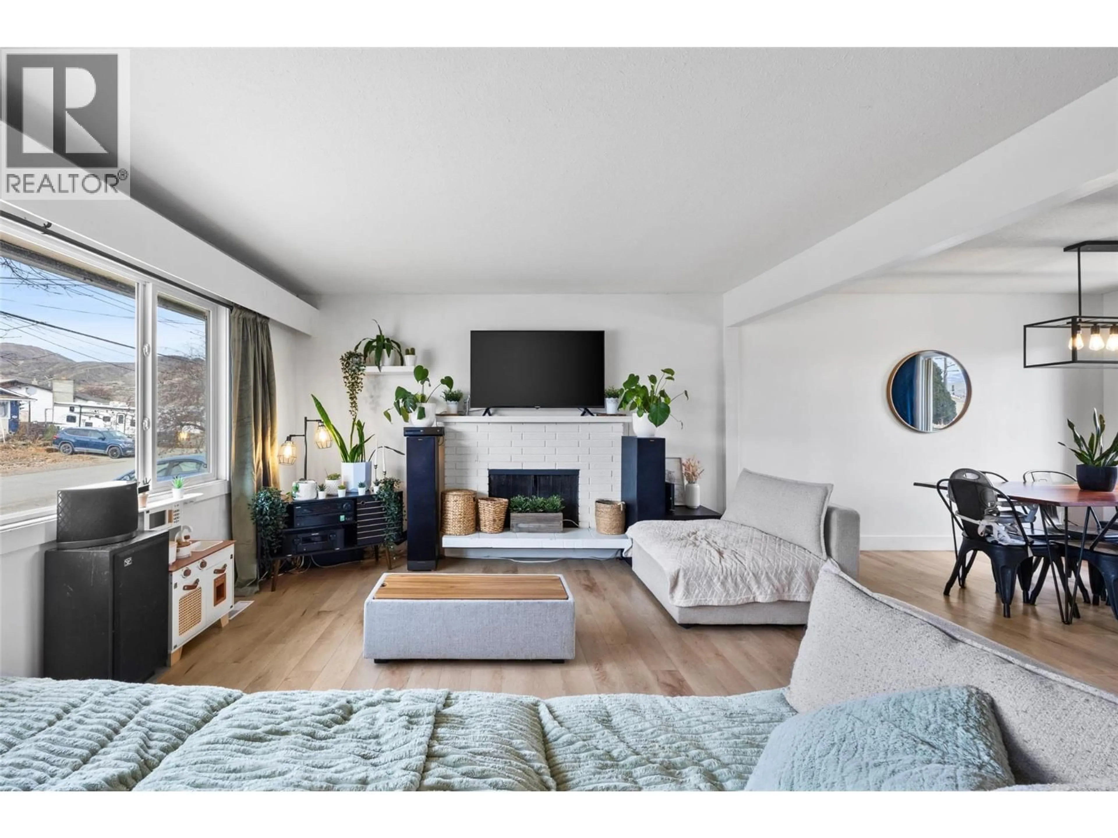 Living room with furniture, wood/laminate floor for 969 RYAN PLACE, Kamloops British Columbia V2C4T4
