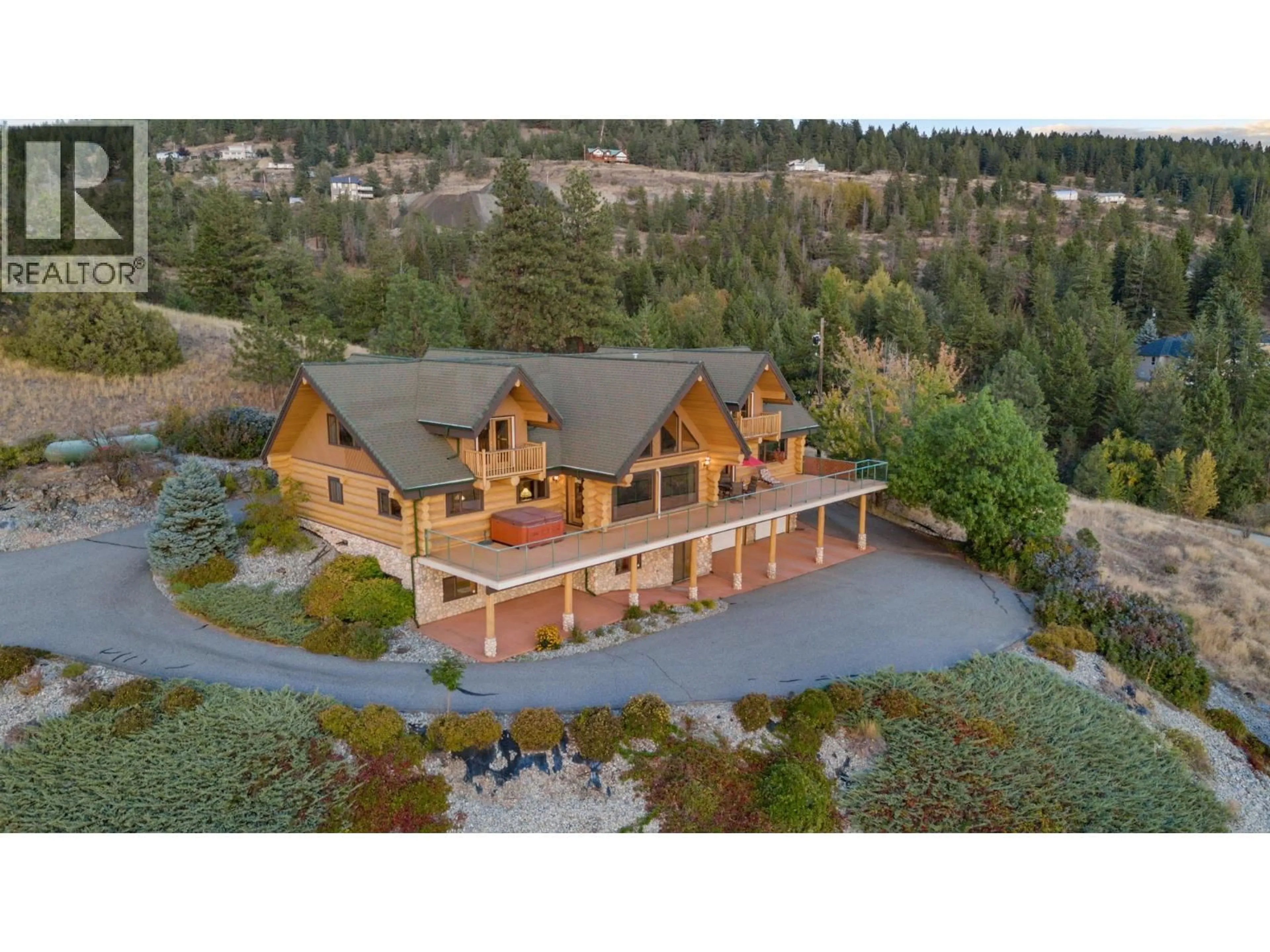 A pic from outside/outdoor area/front of a property/back of a property/a pic from drone, mountain view for 4520 FARMERS DRIVE, Kelowna British Columbia V1P1A3