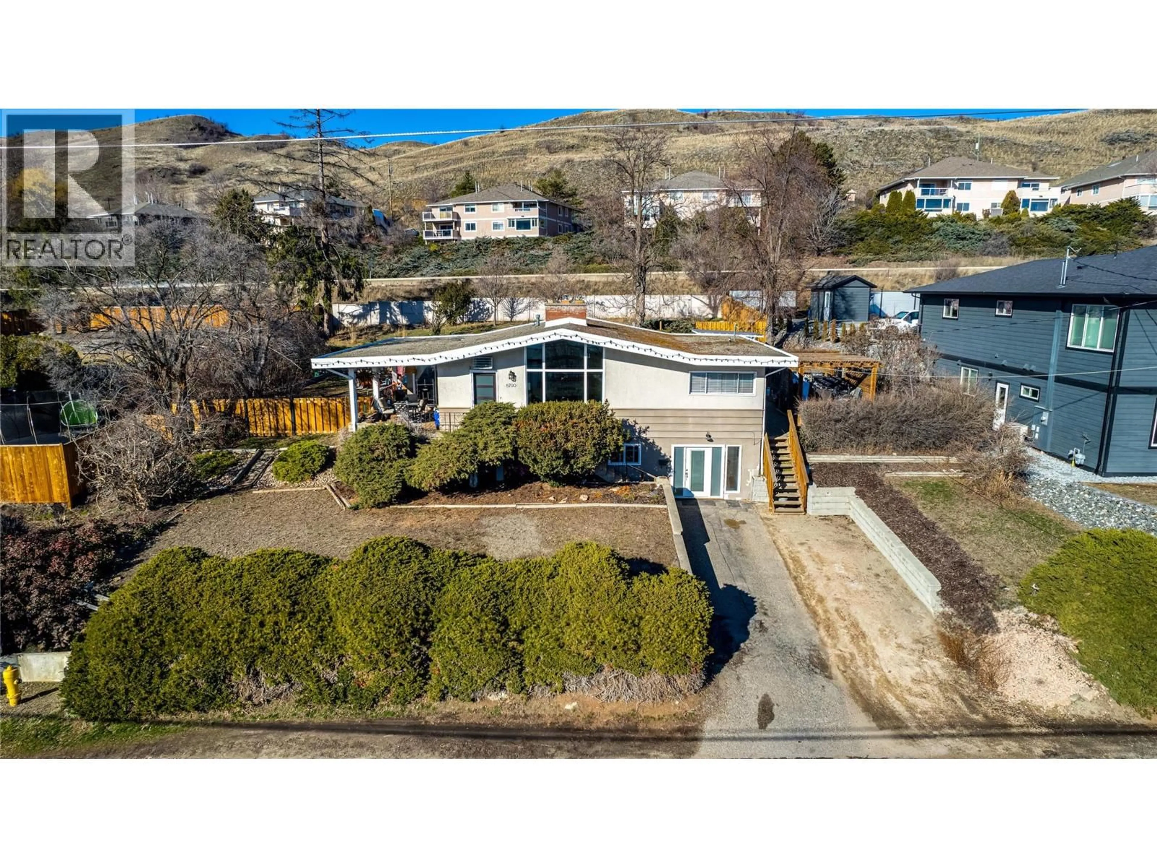 A pic from outside/outdoor area/front of a property/back of a property/a pic from drone, water/lake/river/ocean view for 8700 LAKEVIEW DRIVE, Coldstream British Columbia V1B1W3