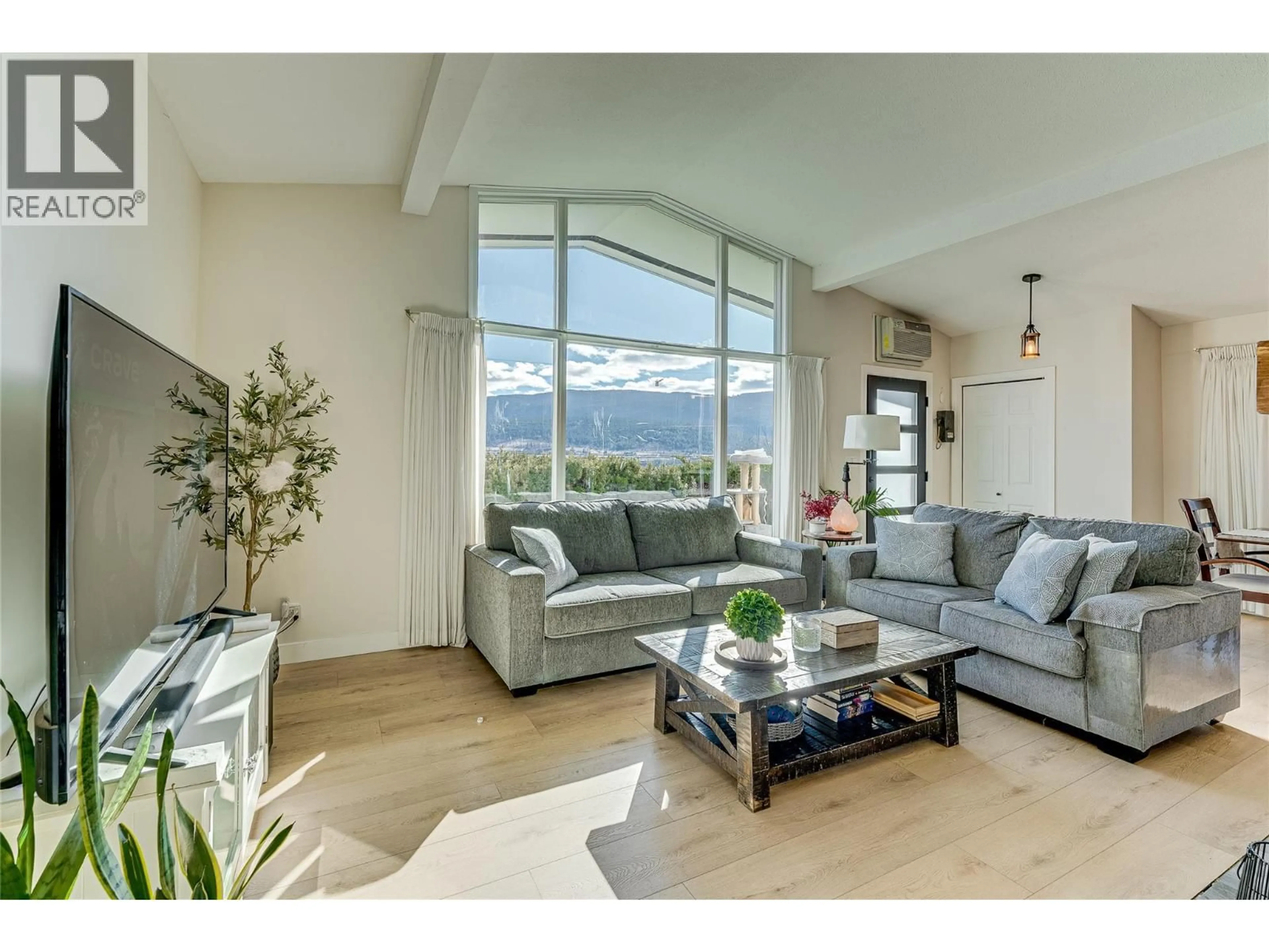 Living room with furniture, unknown for 8700 LAKEVIEW DRIVE, Coldstream British Columbia V1B1W3