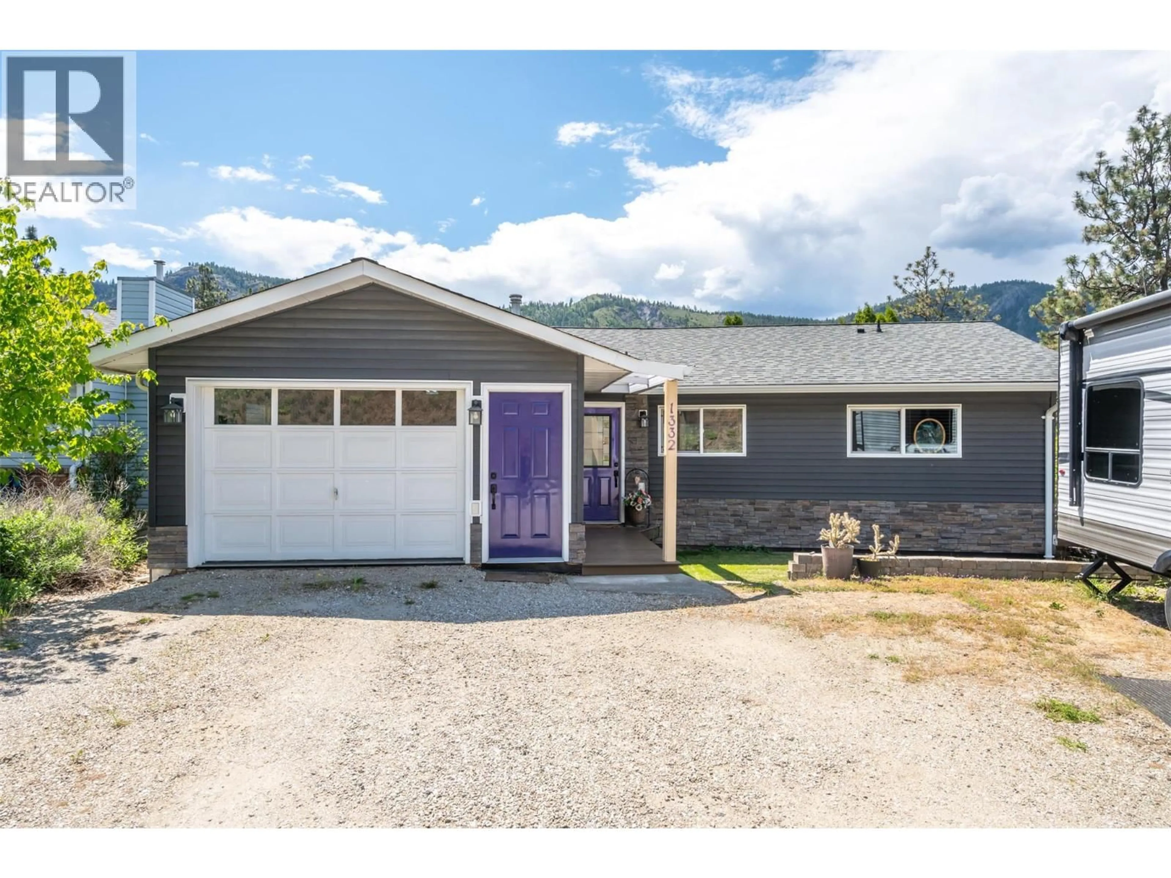 Home with vinyl exterior material, street for 1332 PEACHCLIFF DRIVE, Okanagan Falls British Columbia V0H1R1