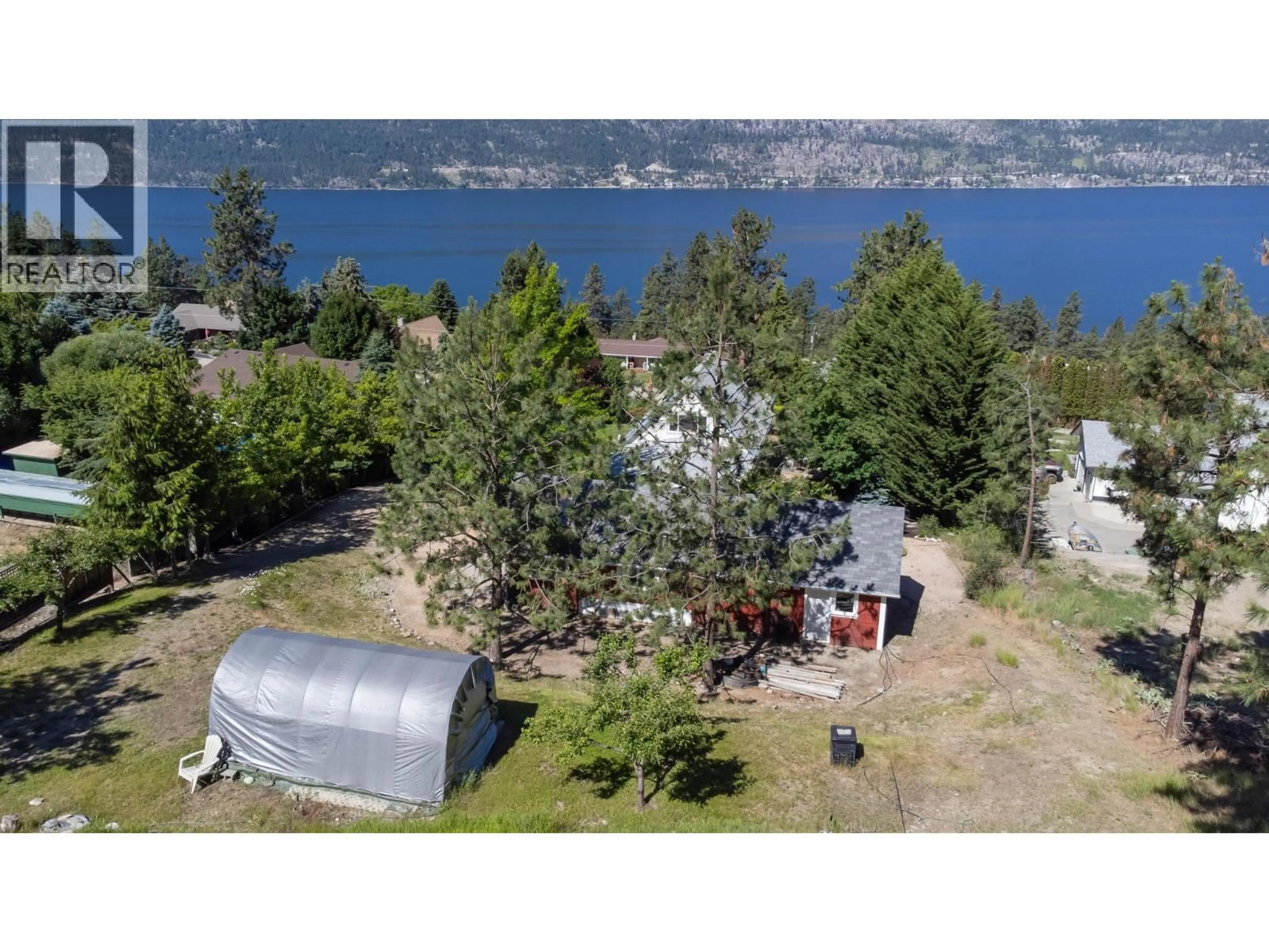 A pic from outside/outdoor area/front of a property/back of a property/a pic from drone, water/lake/river/ocean view for 10987 HARE ROAD, Lake Country British Columbia V4V2H6