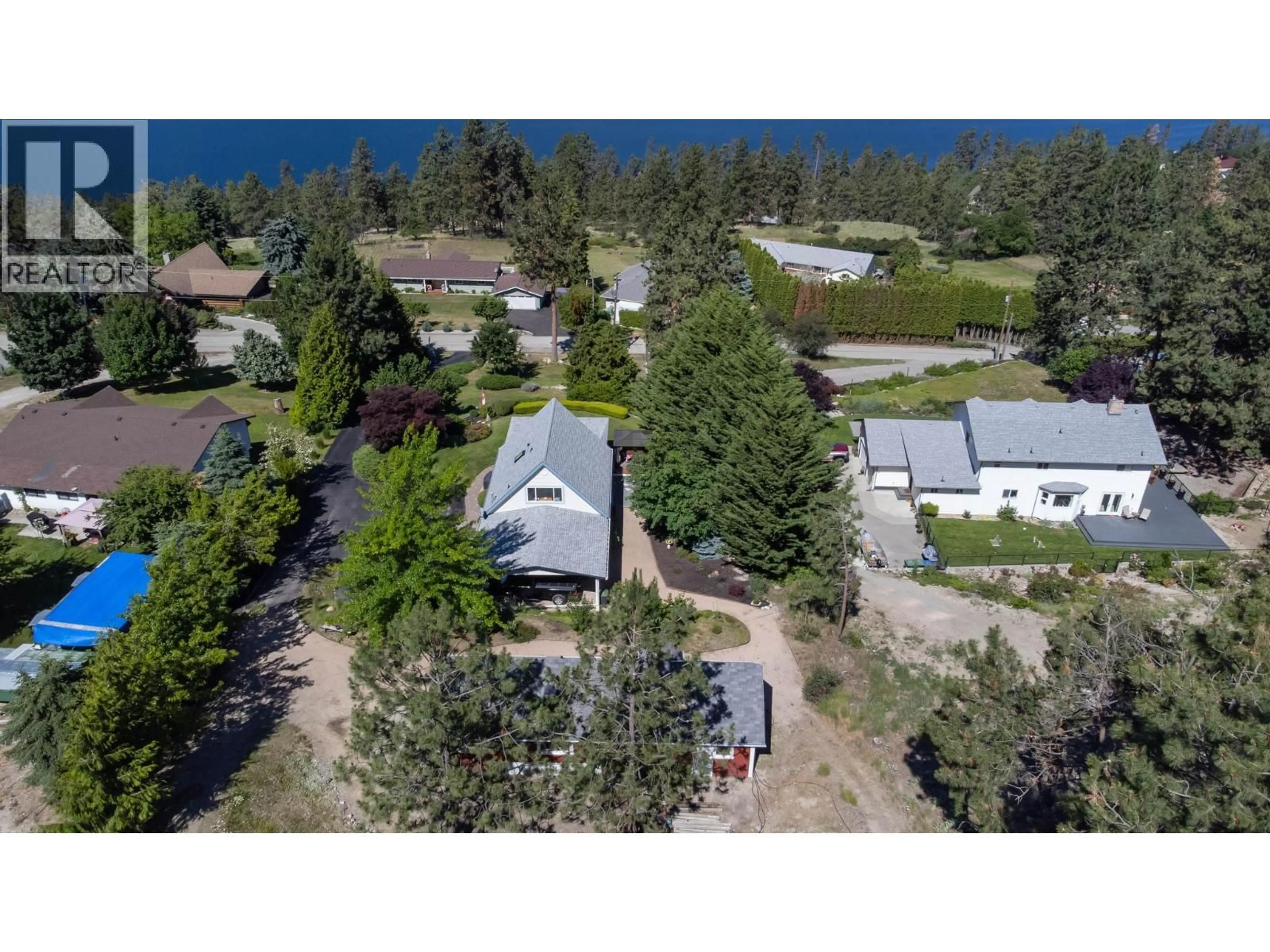 A pic from outside/outdoor area/front of a property/back of a property/a pic from drone, unknown for 10987 HARE ROAD, Lake Country British Columbia V4V2H6