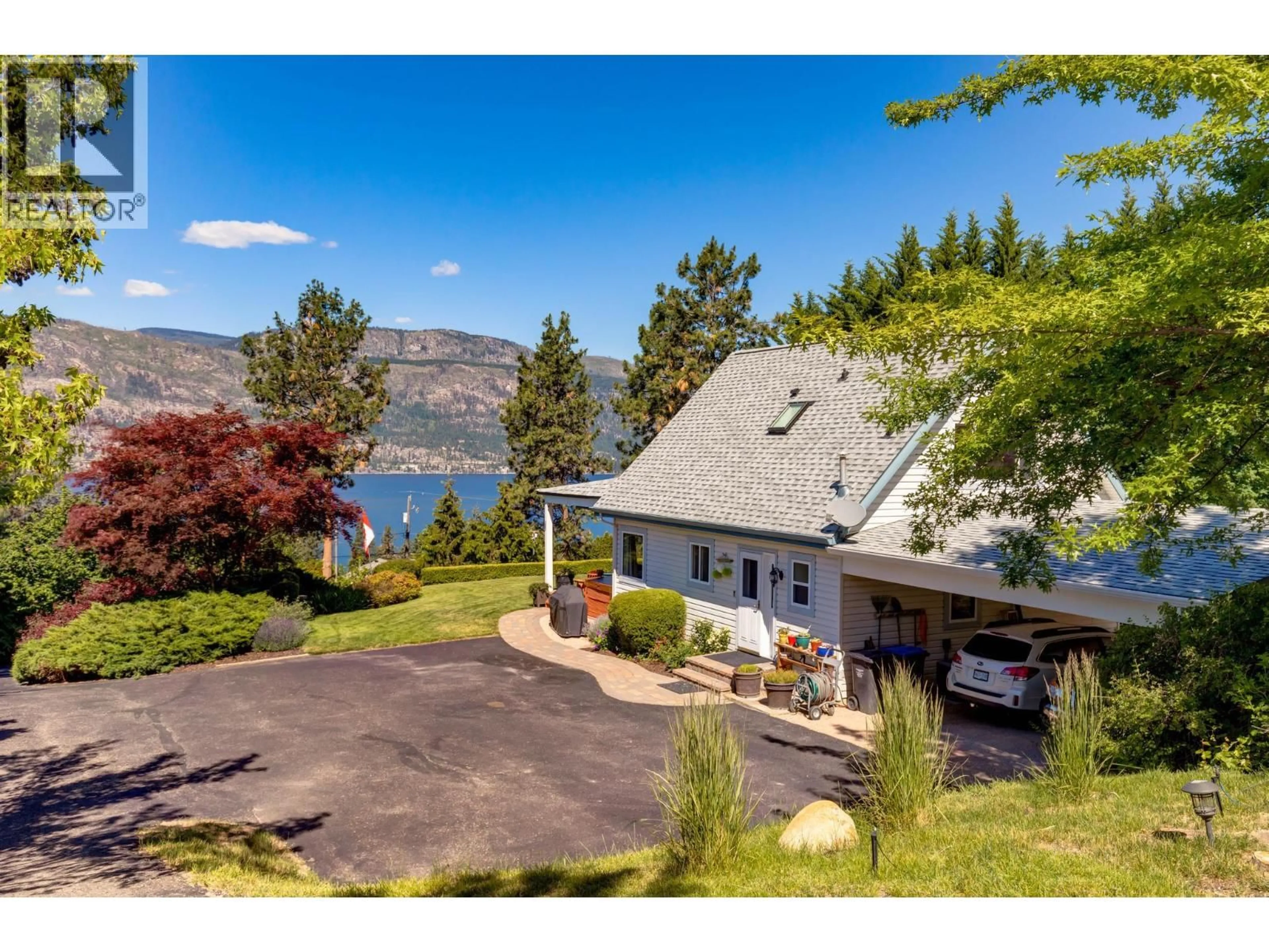 A pic from outside/outdoor area/front of a property/back of a property/a pic from drone, water/lake/river/ocean view for 10987 HARE ROAD, Lake Country British Columbia V4V2H6