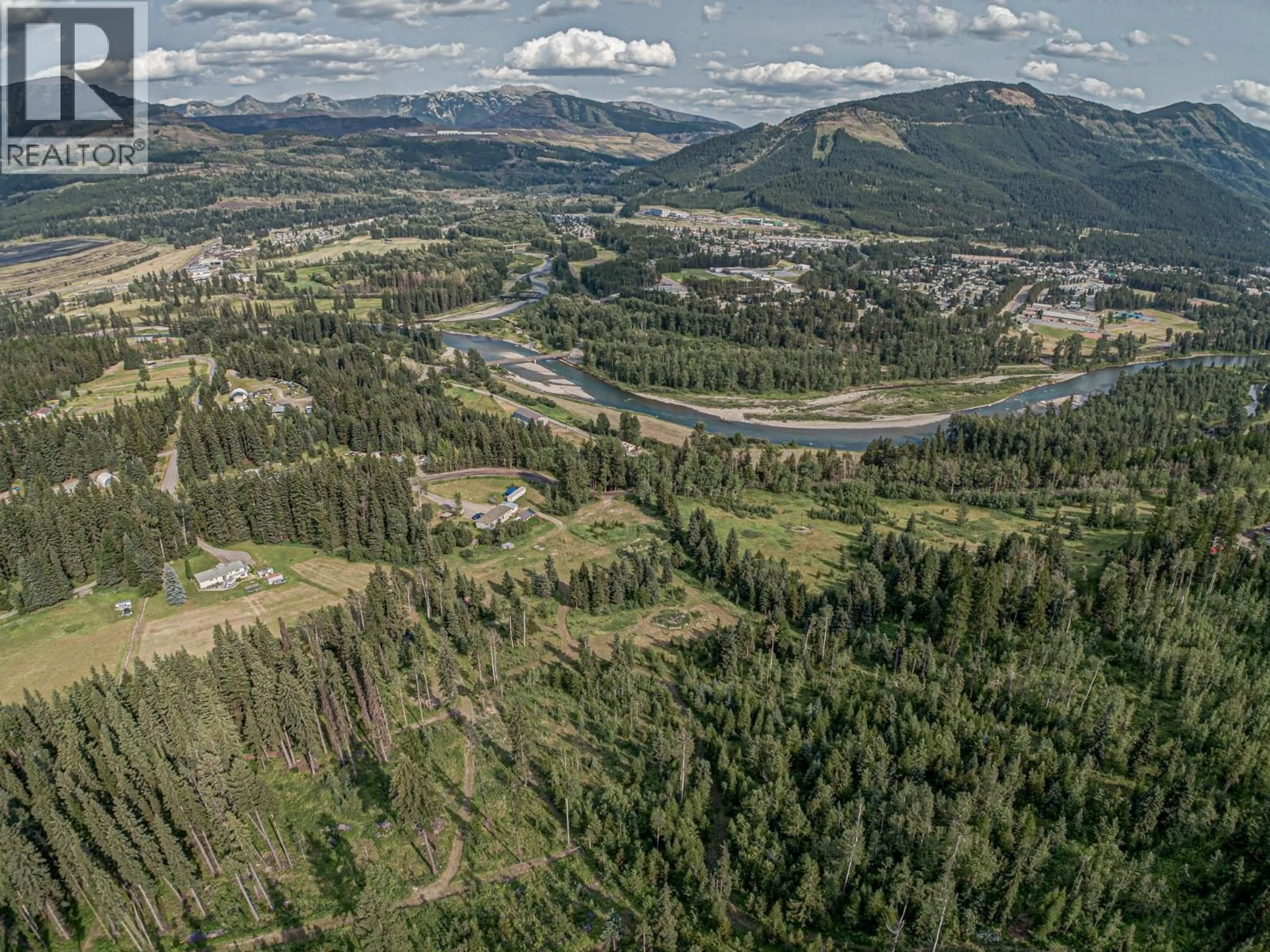A pic from outside/outdoor area/front of a property/back of a property/a pic from drone, mountain view for 1191 MATEVIC ROAD, Sparwood British Columbia V0B2G1