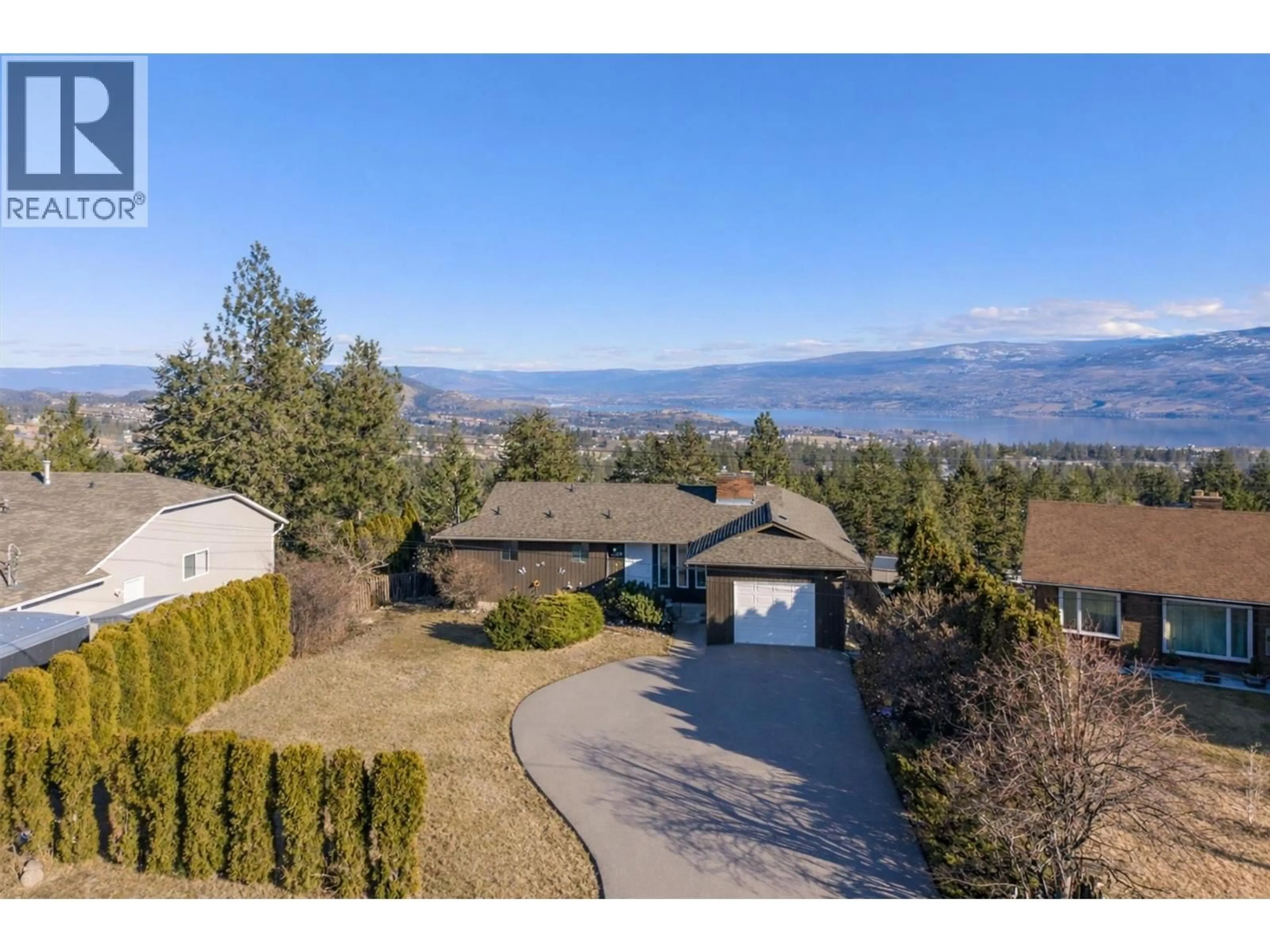 A pic from outside/outdoor area/front of a property/back of a property/a pic from drone, mountain view for 3369 MCMURCHIE ROAD, West Kelowna British Columbia V4T1B4