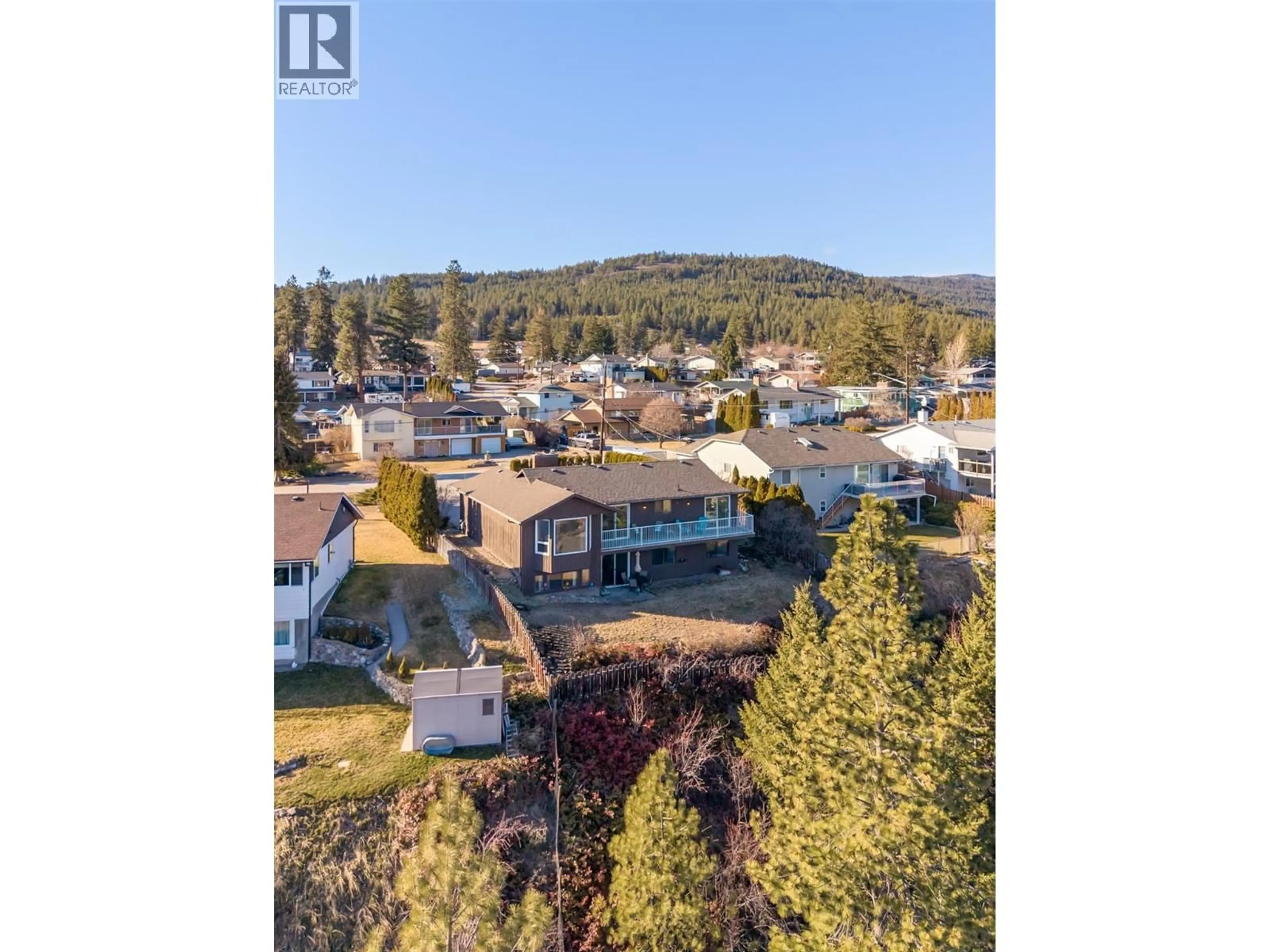 A pic from outside/outdoor area/front of a property/back of a property/a pic from drone, water/lake/river/ocean view for 3369 MCMURCHIE ROAD, West Kelowna British Columbia V4T1B4