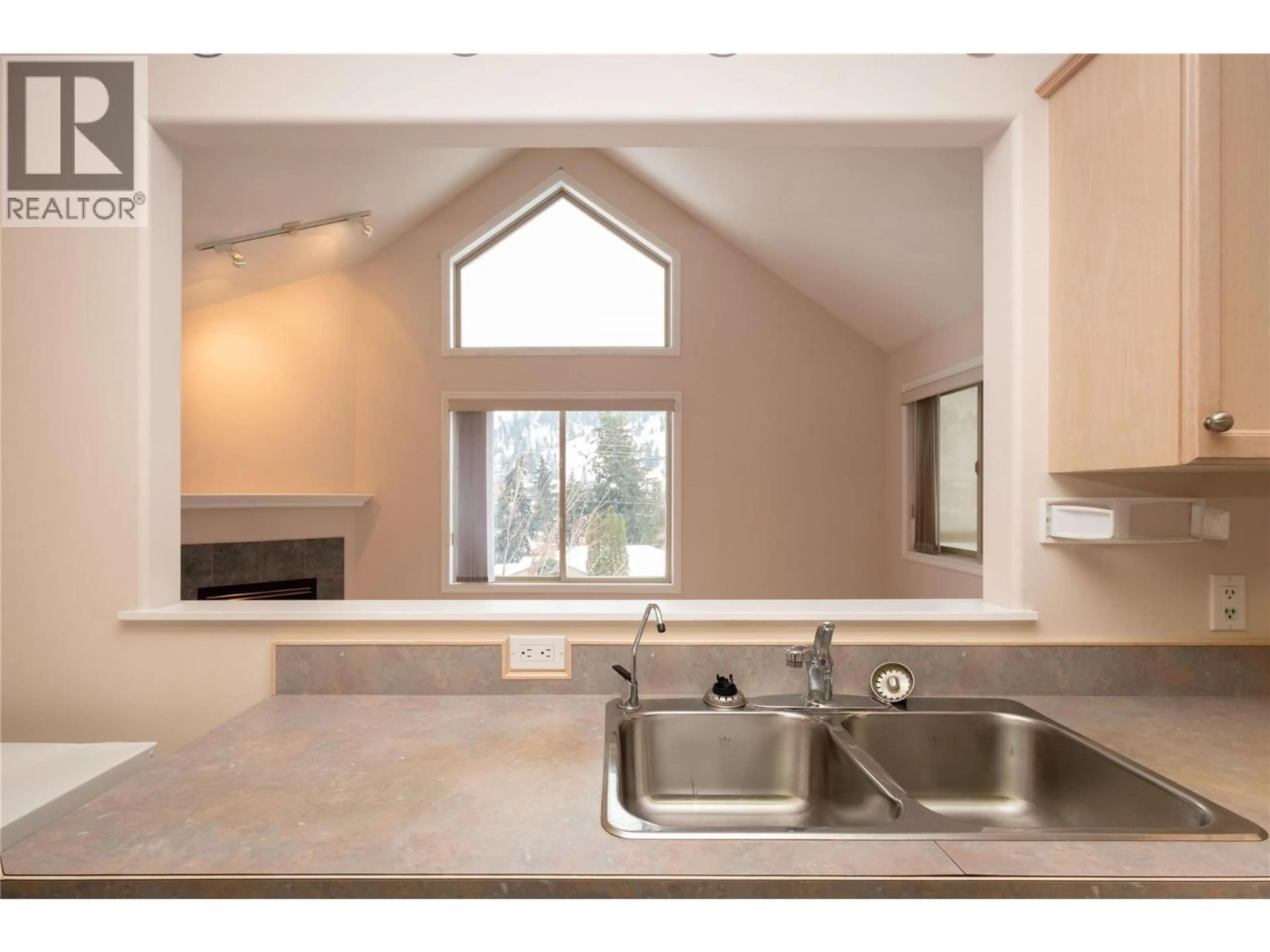 Open concept kitchen, ceramic/tile floor for 306 - 8416 JUBILEE ROAD, Summerland British Columbia V0H1Z5