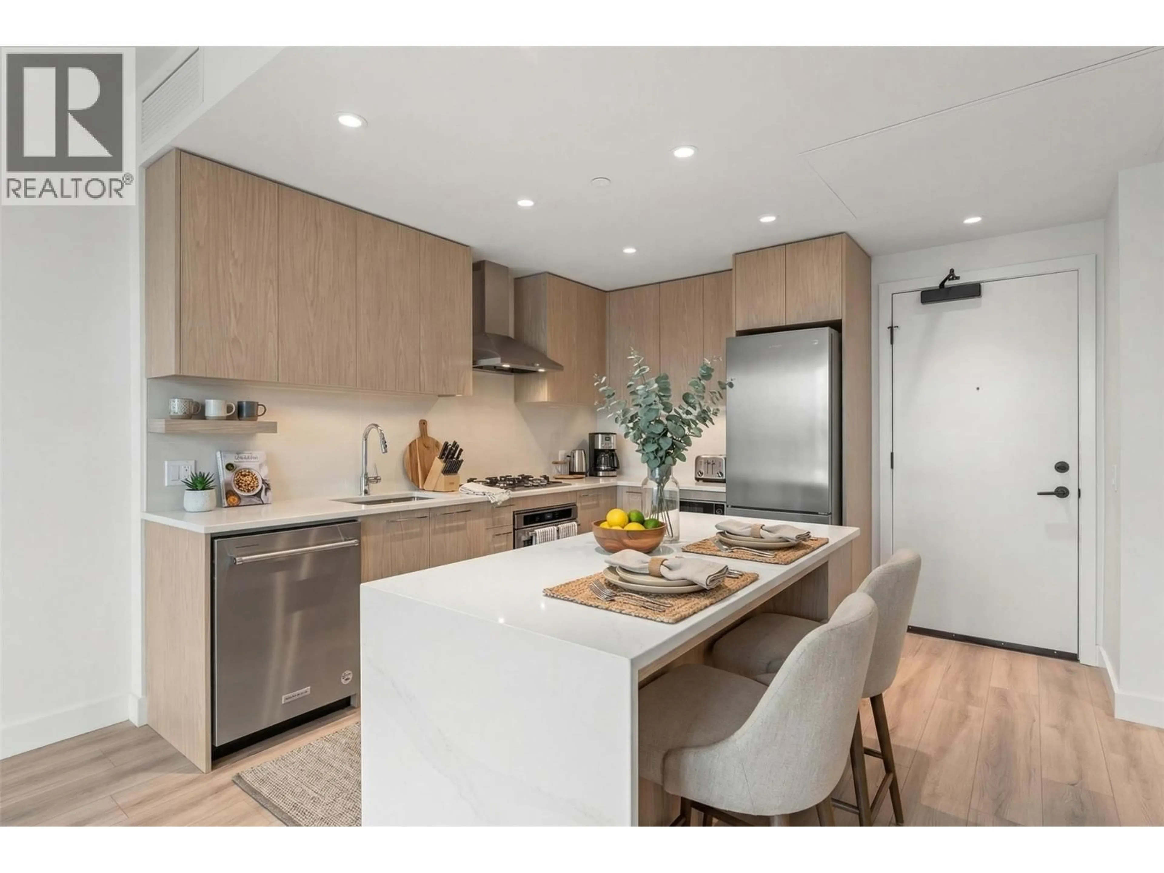 Open concept kitchen, wood/laminate floor for 508 - 3051 ABBOTT STREET, Kelowna British Columbia V1Y1G9