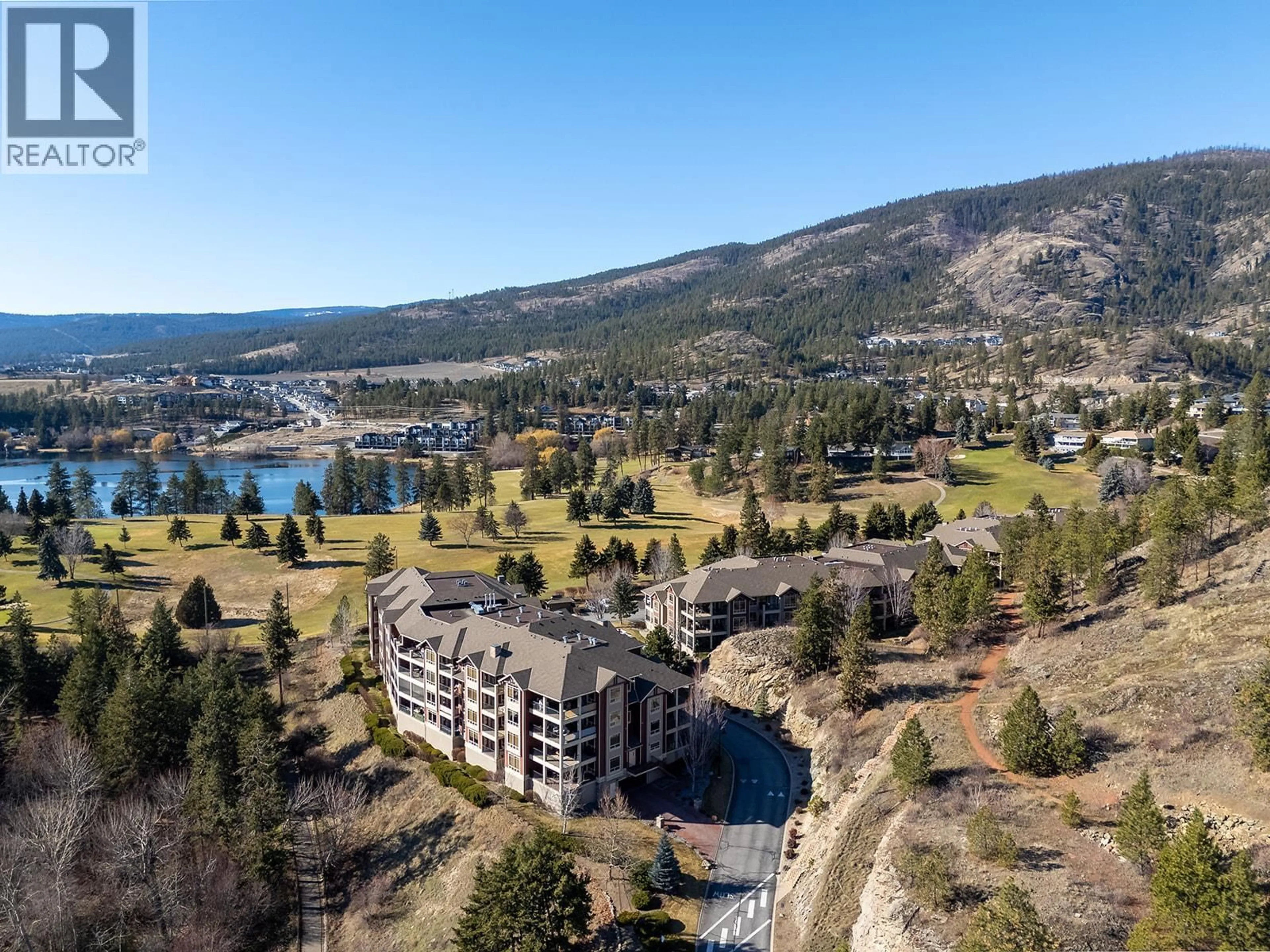 A pic from outside/outdoor area/front of a property/back of a property/a pic from drone, water/lake/river/ocean view for 108 - 2760 AUBURN ROAD, West Kelowna British Columbia V4T4C2