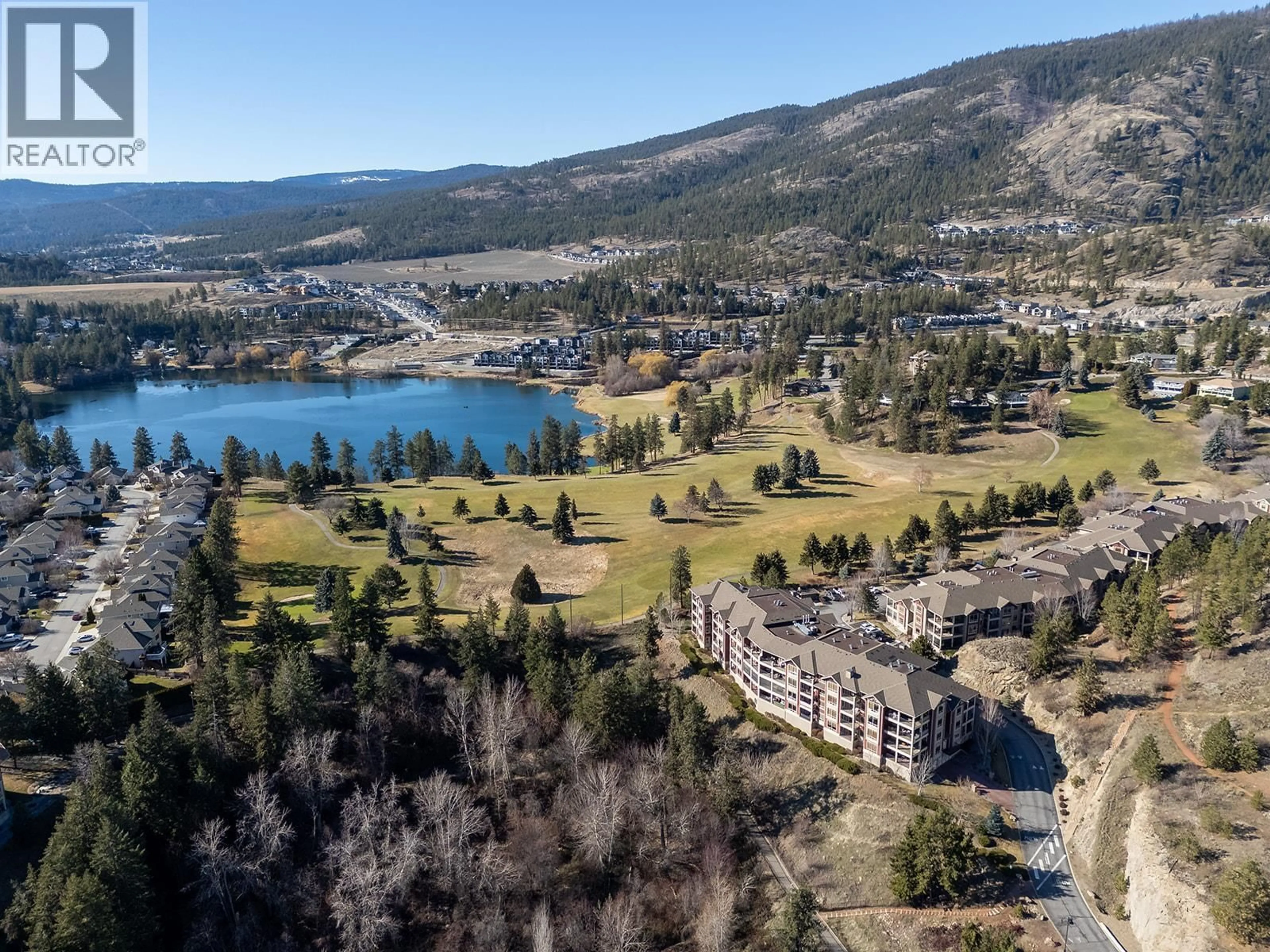 A pic from outside/outdoor area/front of a property/back of a property/a pic from drone, water/lake/river/ocean view for 108 - 2760 AUBURN ROAD, West Kelowna British Columbia V4T4C2