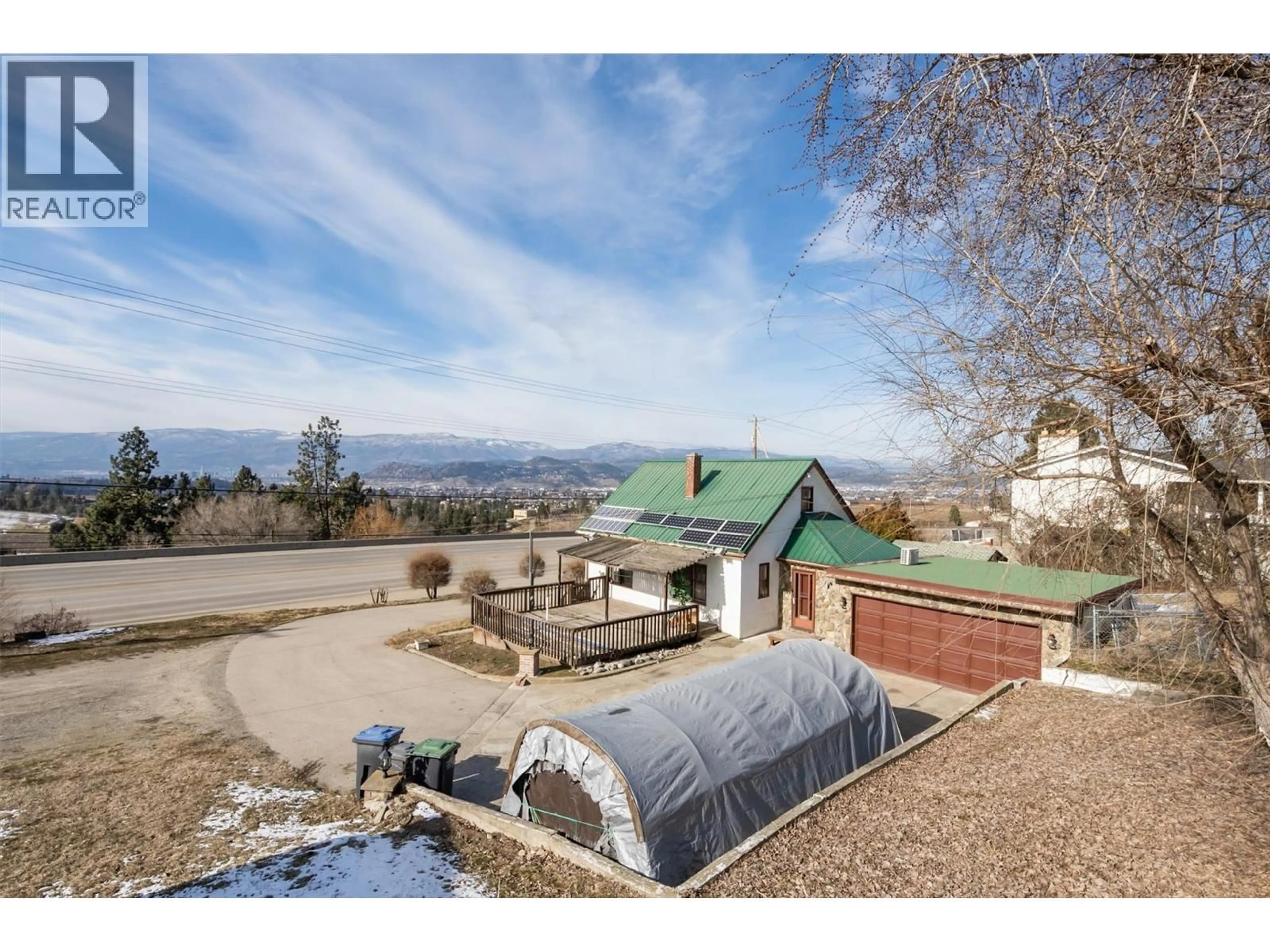 A pic from outside/outdoor area/front of a property/back of a property/a pic from drone, mountain view for 1260 HIGHWAY 33 OTHER, Kelowna British Columbia V1P1M1