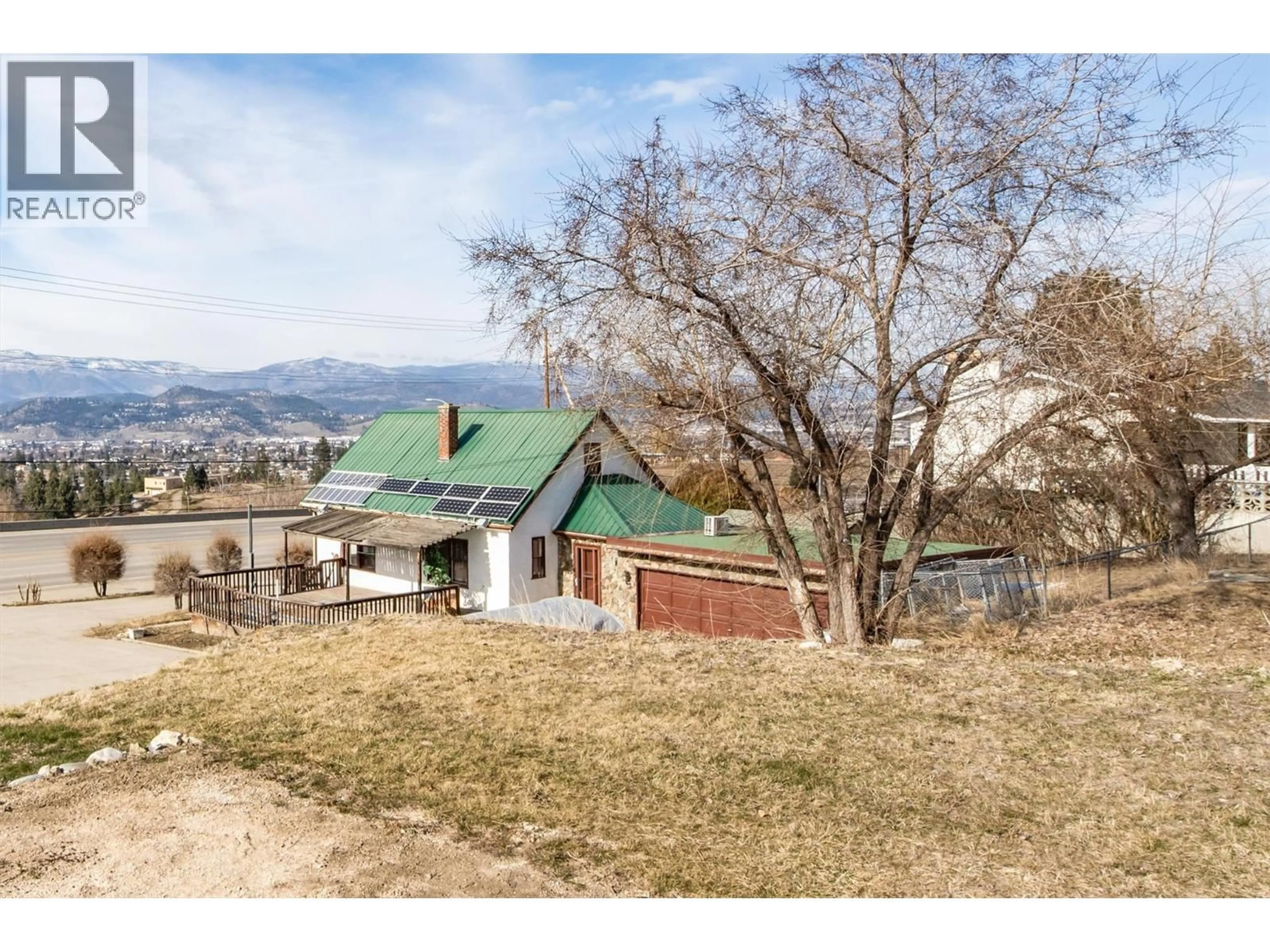 A pic from outside/outdoor area/front of a property/back of a property/a pic from drone, mountain view for 1260 HIGHWAY 33 OTHER, Kelowna British Columbia V1P1M1