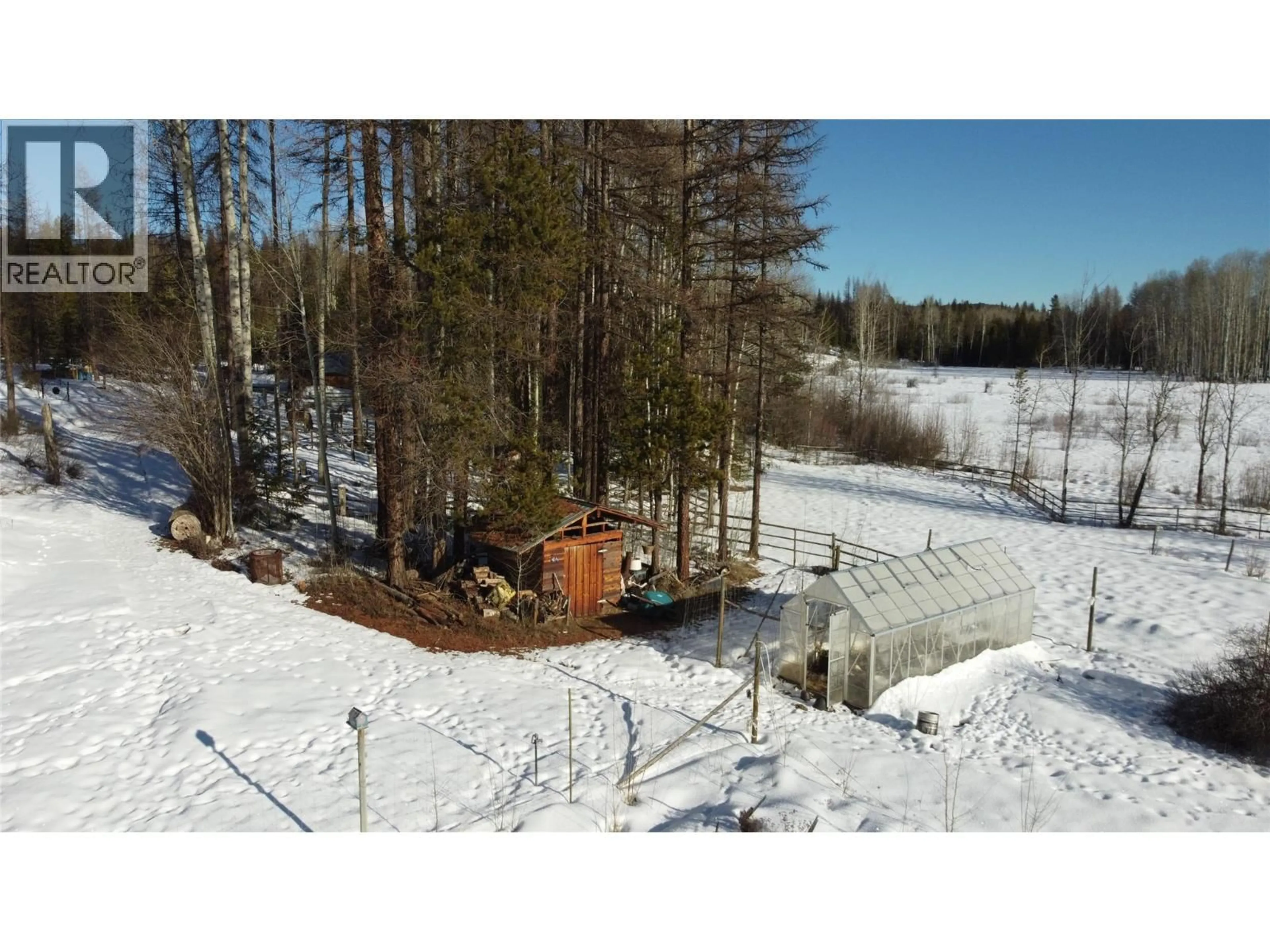 A pic from outside/outdoor area/front of a property/back of a property/a pic from drone, forest/trees view for 2120 FISH LAKE ROAD, Rock Creek British Columbia V0H1Y0