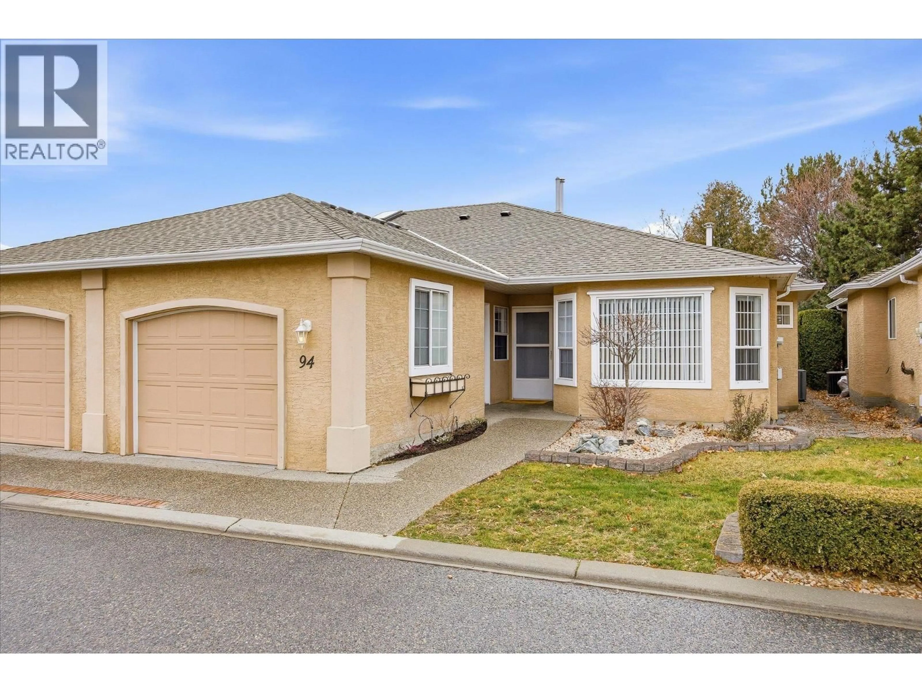 Home with vinyl exterior material, street for 94 - 2250 LOUIE DRIVE, West Kelowna British Columbia V4T2M6