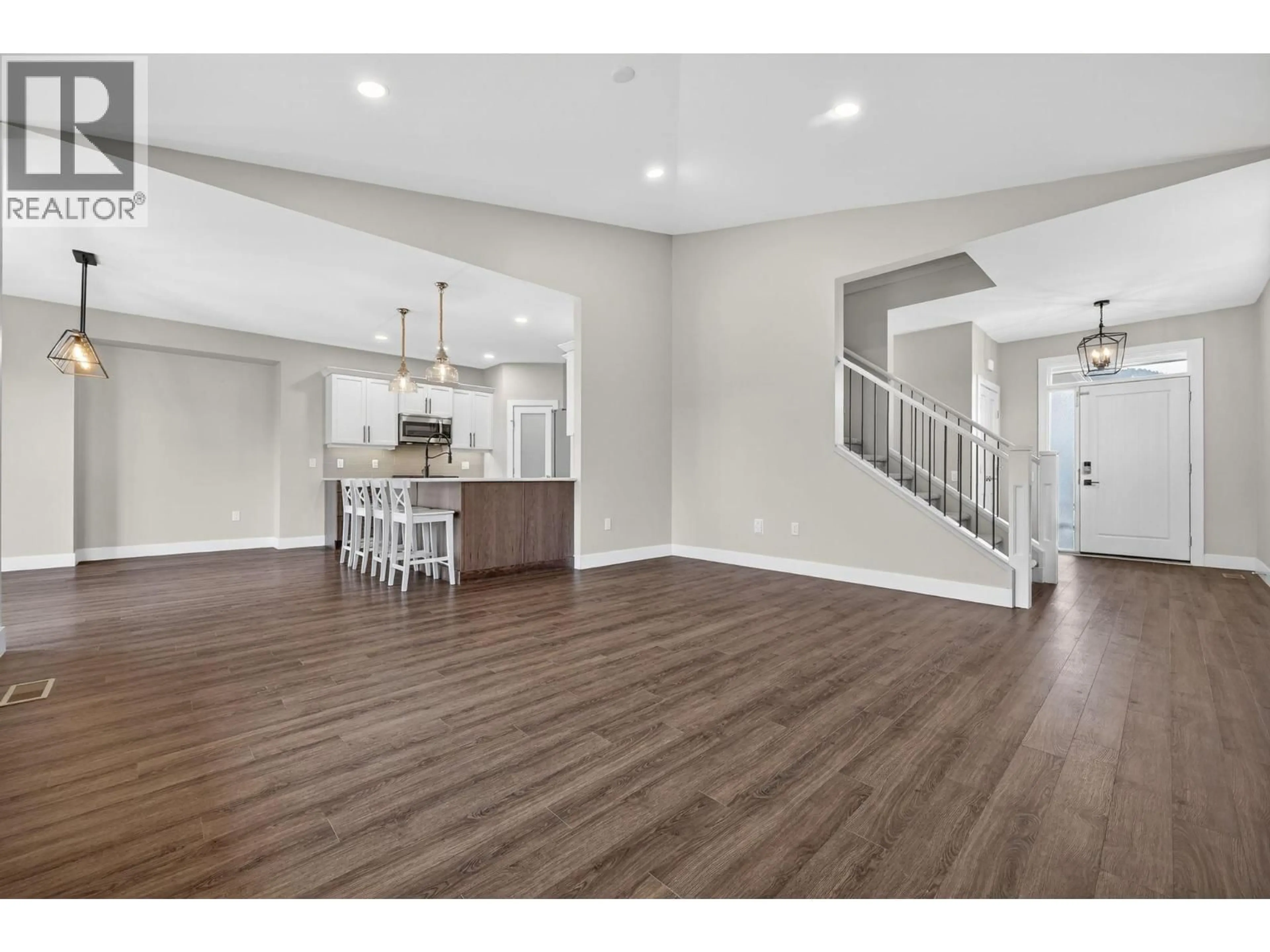 Open concept kitchen, wood/laminate floor for 2312 NORDSTROM AVENUE, Armstrong British Columbia V0E1B8