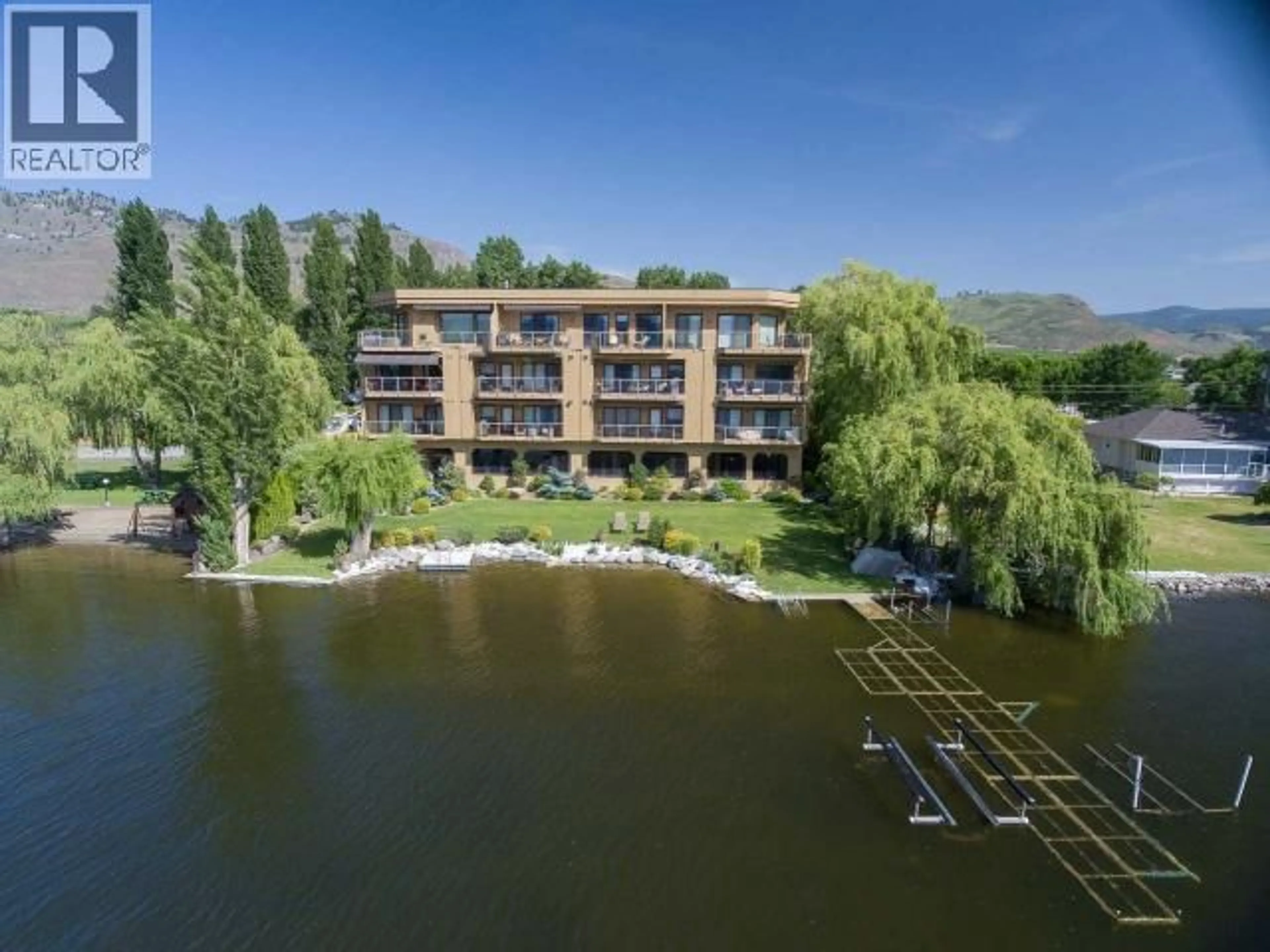 A pic from outside/outdoor area/front of a property/back of a property/a pic from drone, water/lake/river/ocean view for 302 - 2418 LAKESHORE DRIVE, Osoyoos British Columbia V0H1V6