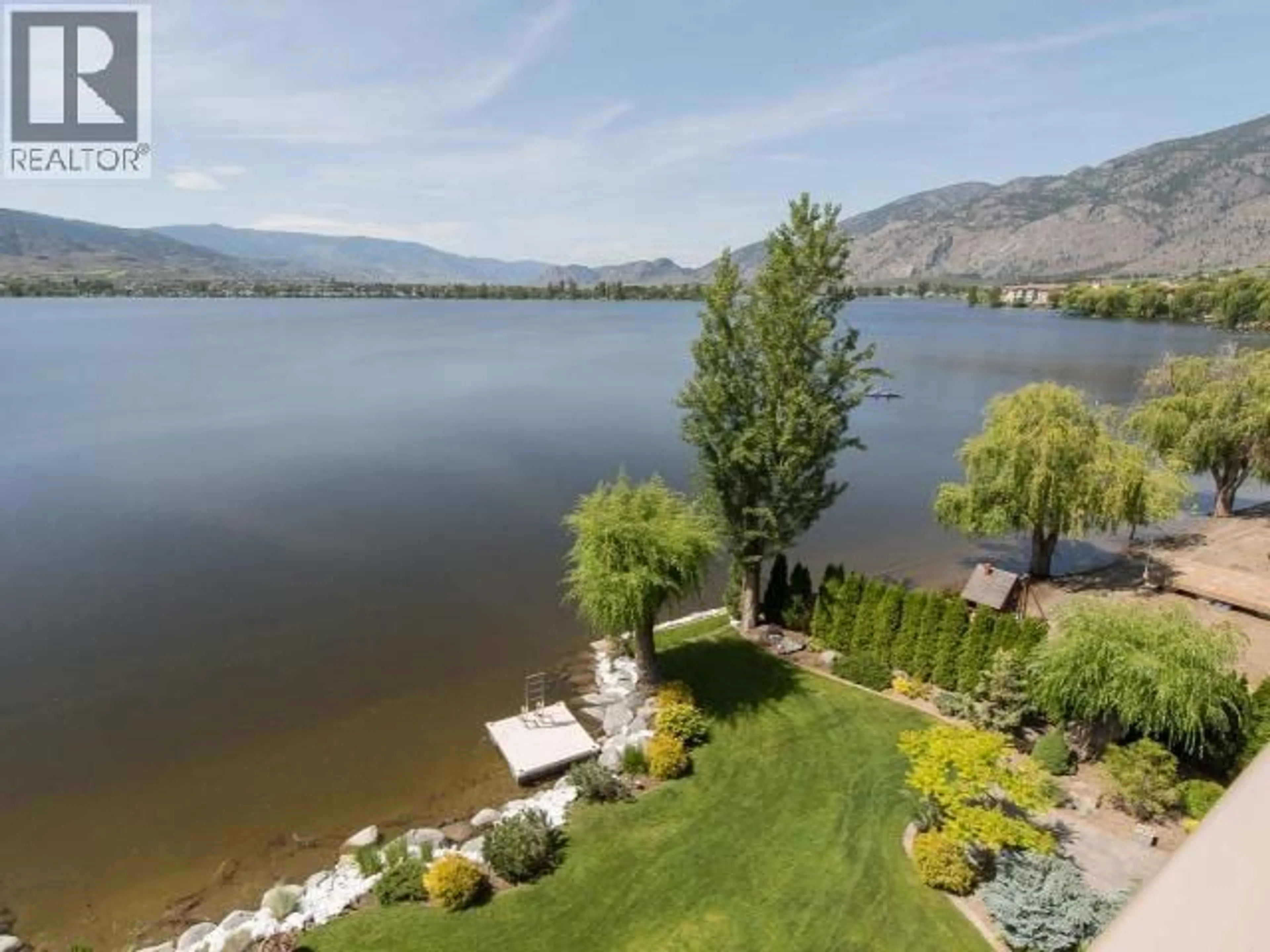 A pic from outside/outdoor area/front of a property/back of a property/a pic from drone, water/lake/river/ocean view for 302 - 2418 LAKESHORE DRIVE, Osoyoos British Columbia V0H1V6