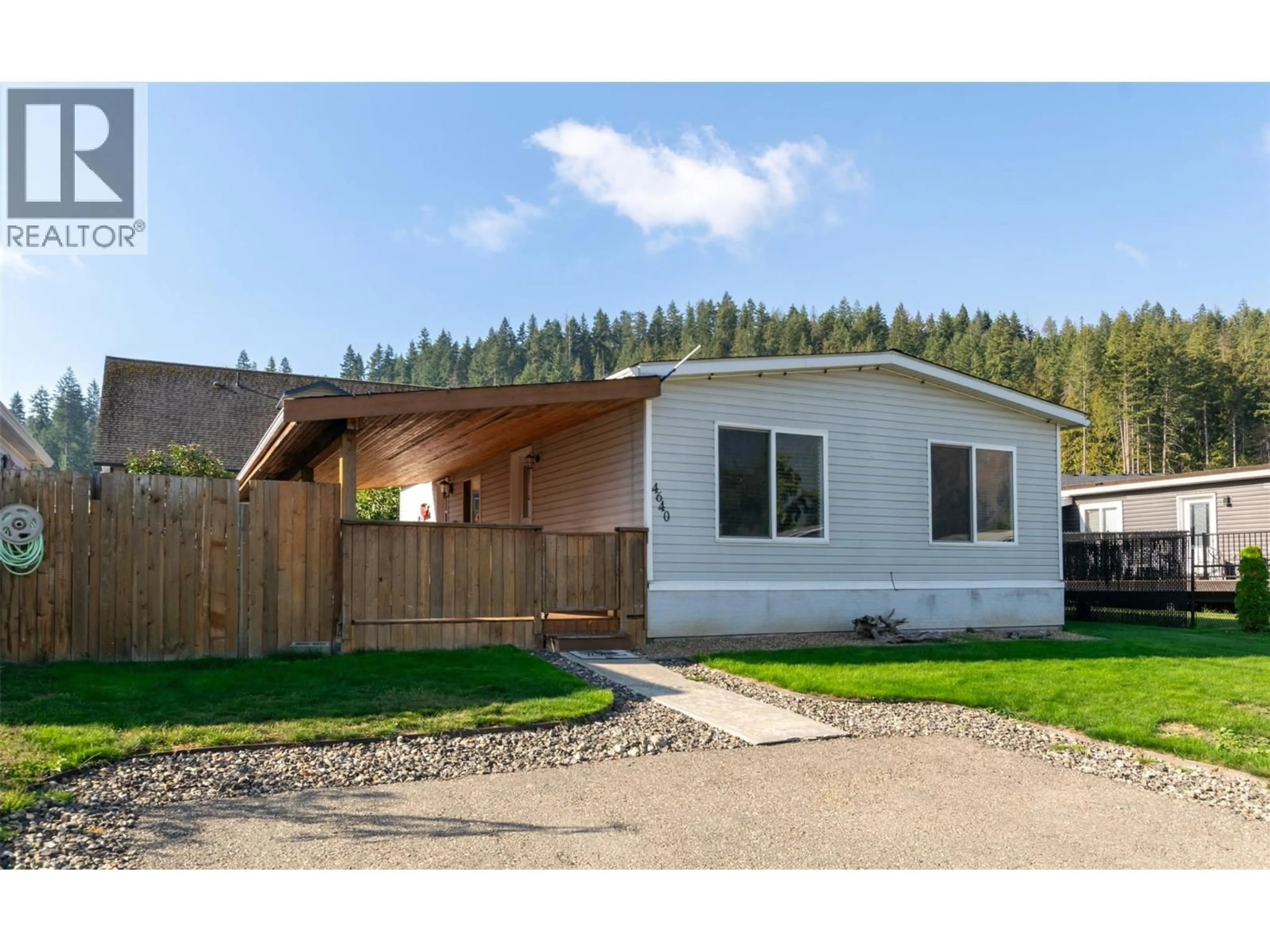 Home with vinyl exterior material, street for 4640 73 AVENUE NORTHEAST, Salmon Arm British Columbia V0E1K0