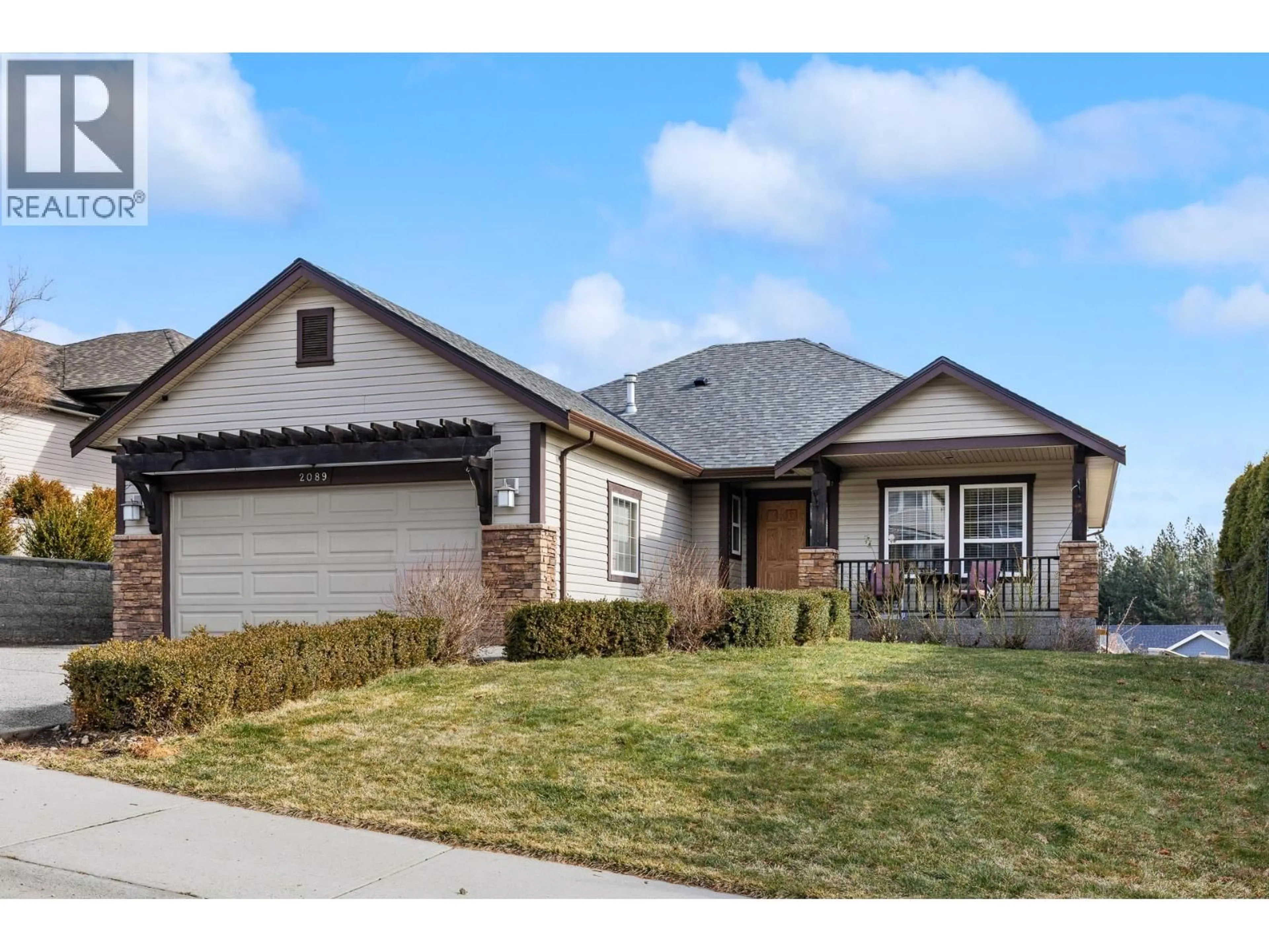 Home with brick exterior material, street for 2089 ROSE TREE ROAD, West Kelowna British Columbia V1Z4A7