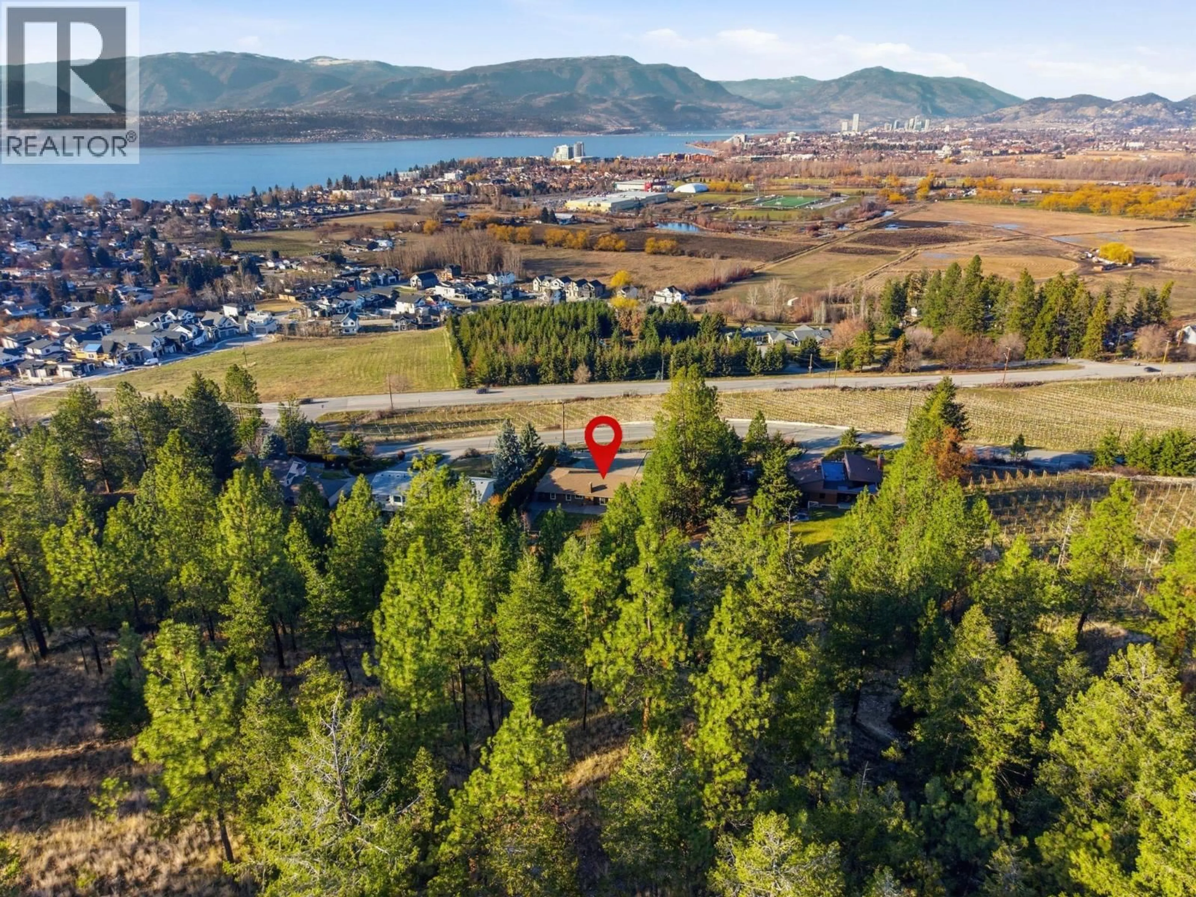 A pic from outside/outdoor area/front of a property/back of a property/a pic from drone, water/lake/river/ocean view for 1099 DEHART ROAD, Kelowna British Columbia V1W4N2
