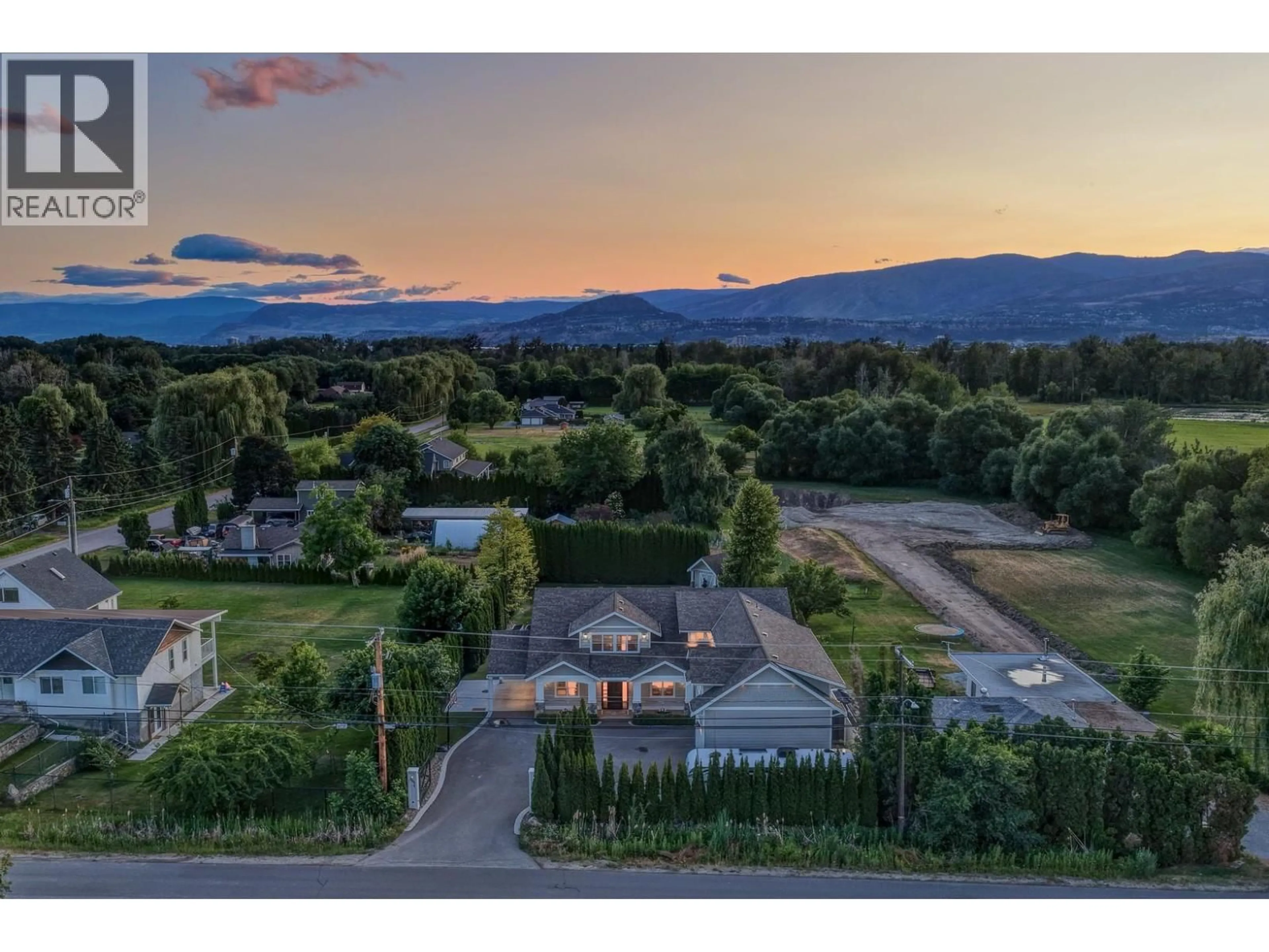 A pic from outside/outdoor area/front of a property/back of a property/a pic from drone, mountain view for 3558 SPIERS ROAD, Kelowna British Columbia V1W4A8