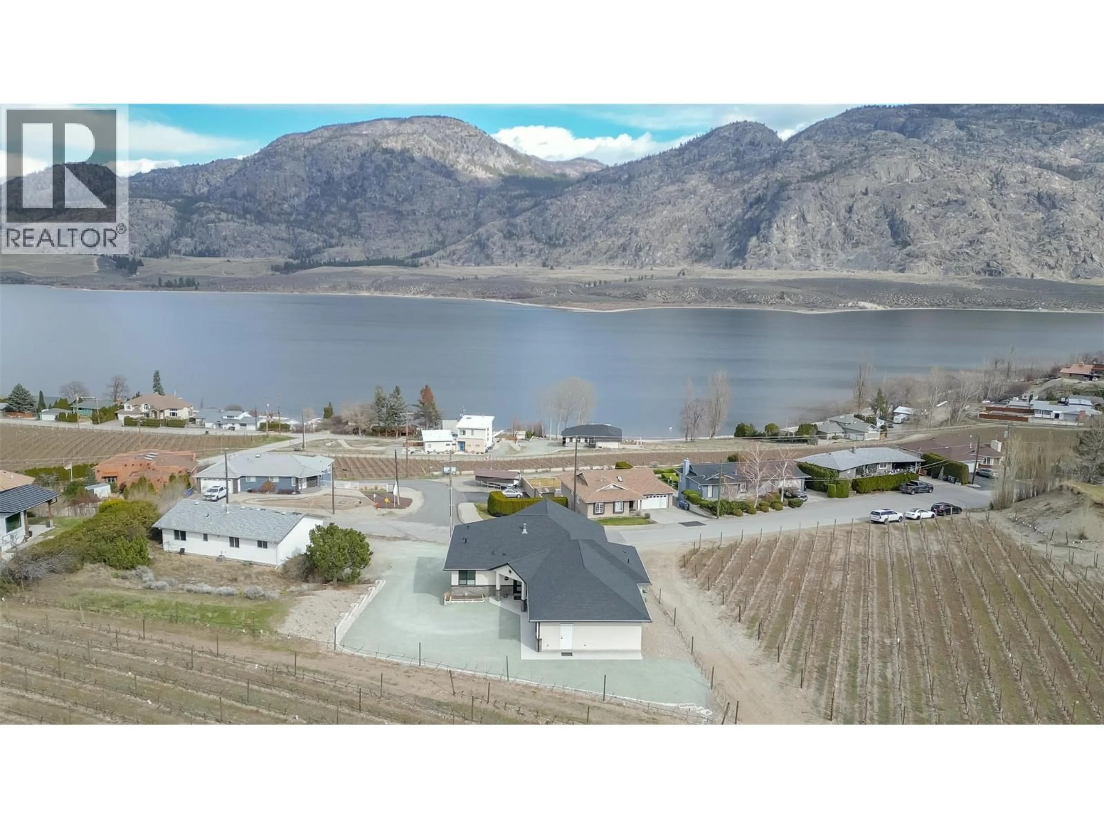 A pic from outside/outdoor area/front of a property/back of a property/a pic from drone, water/lake/river/ocean view for 10400 87TH STREET, Osoyoos British Columbia V0H1V2