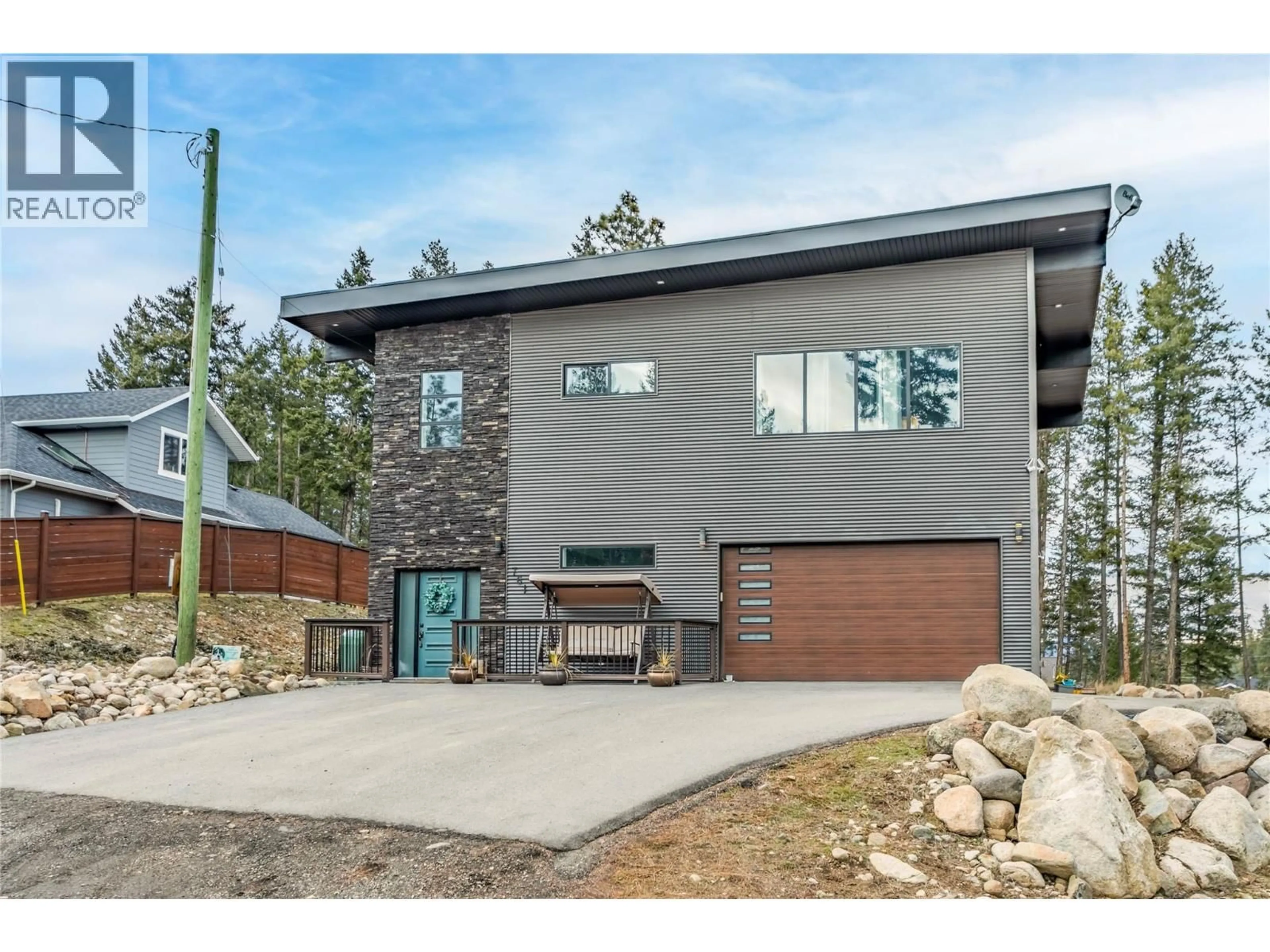 Home with vinyl exterior material, street for 761 FAIRBRIDGE ROAD, Kelowna British Columbia V1Z3W3