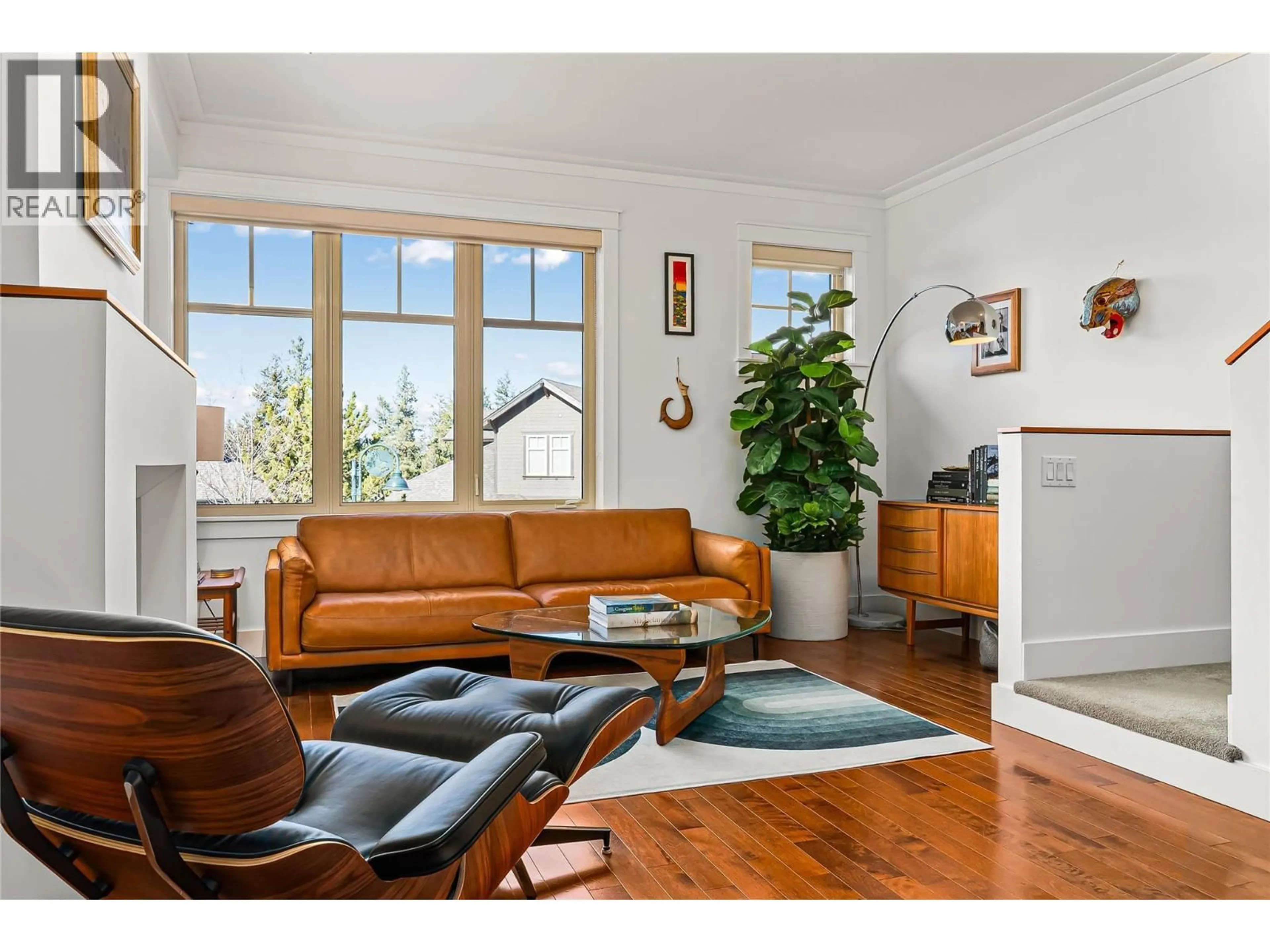 Living room with furniture, wood/laminate floor for 32 - 333 LONGSPOON DRIVE, Vernon British Columbia V1H2L1