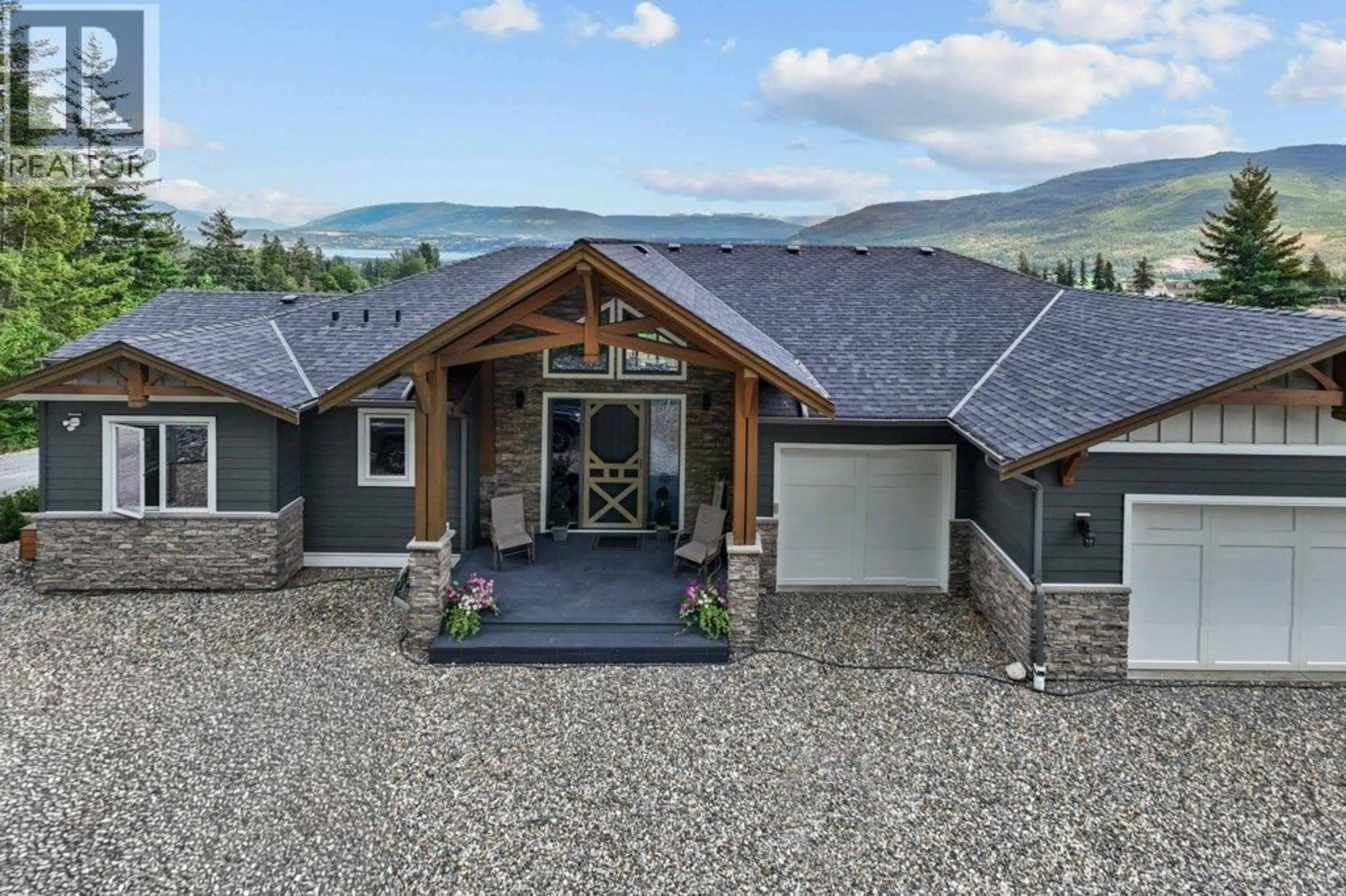 Home with vinyl exterior material, mountain view for 1401 65 STREET SOUTHWEST, Salmon Arm British Columbia V1E3B3