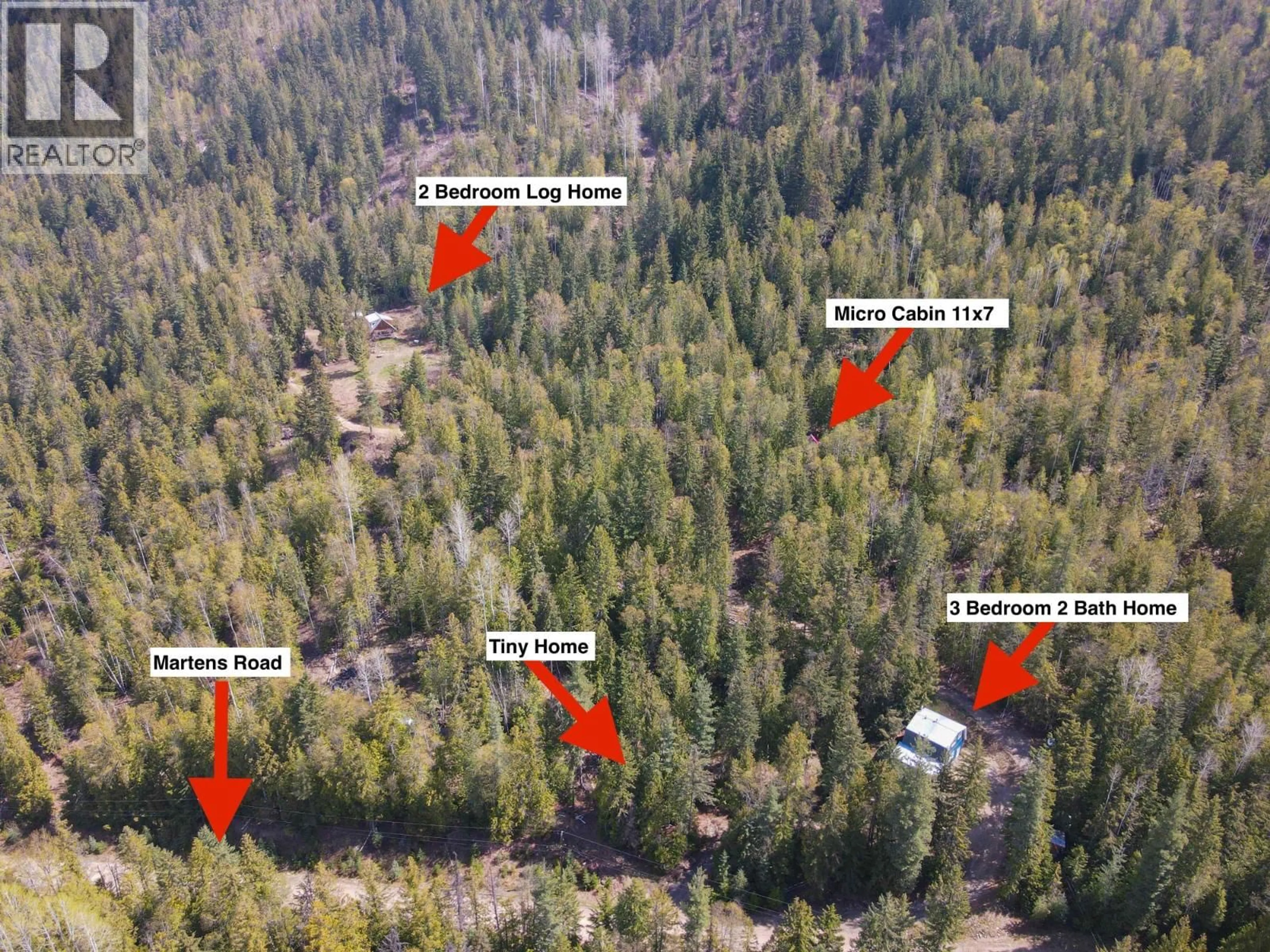A pic from outside/outdoor area/front of a property/back of a property/a pic from drone, forest/trees view for 8907 MARTENS ROAD, Slocan British Columbia V1L1C0