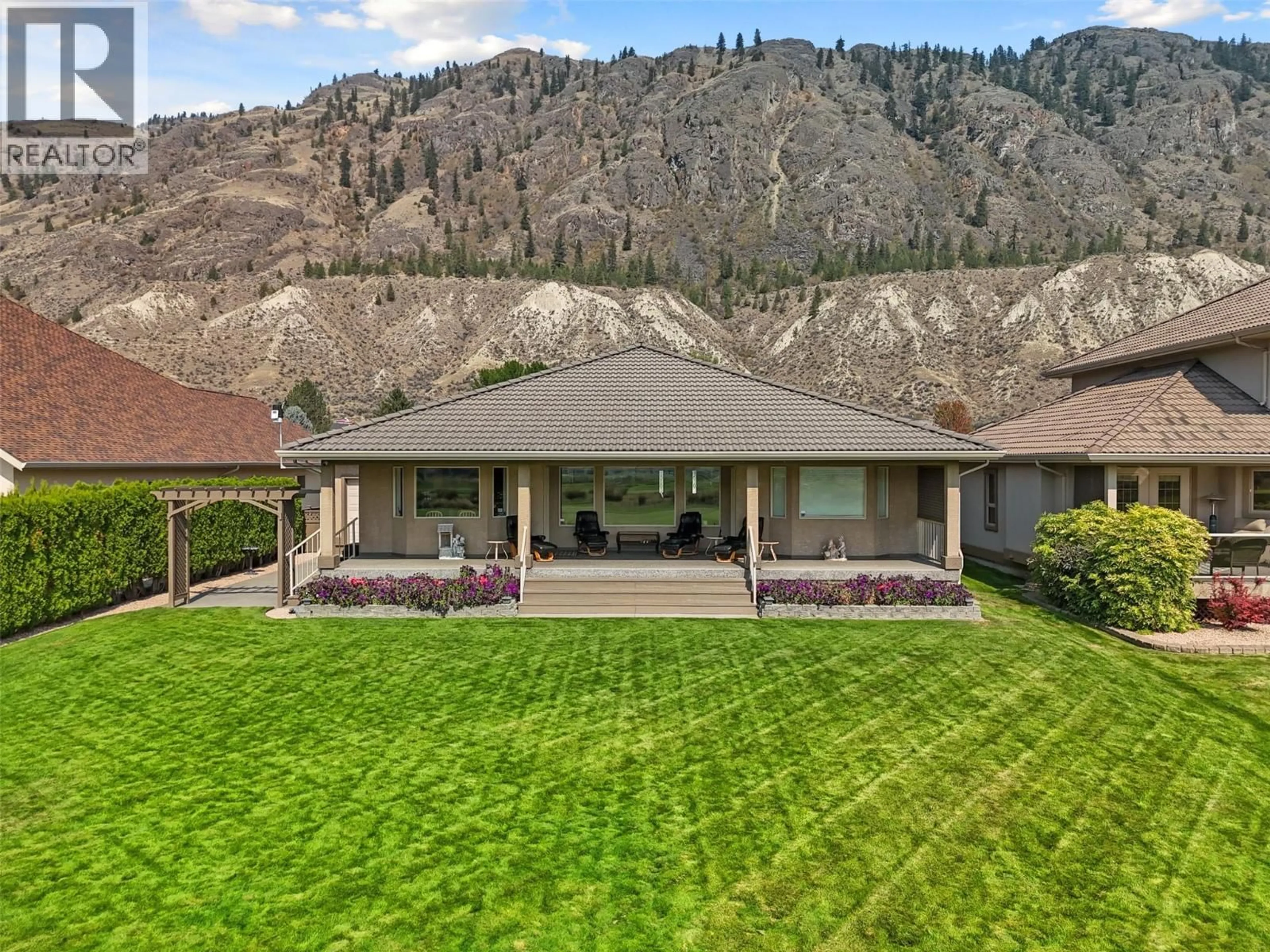 A pic from outside/outdoor area/front of a property/back of a property/a pic from drone, mountain view for 413 NUEVA WYND, Kamloops British Columbia V2H1S1