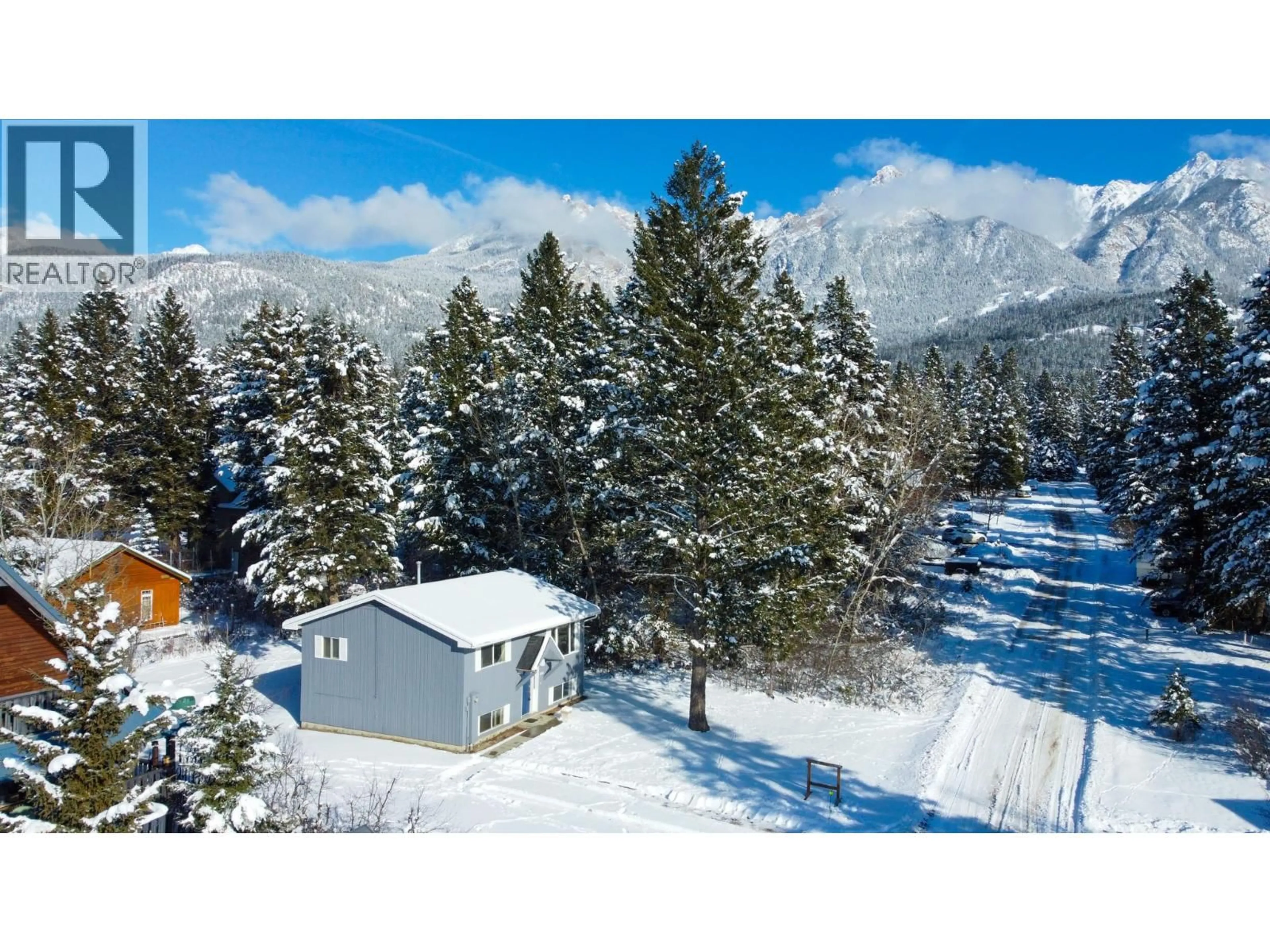 A pic from outside/outdoor area/front of a property/back of a property/a pic from drone, mountain view for 4885 REDWING ROAD, Fairmont Hot Springs British Columbia V0B1L1