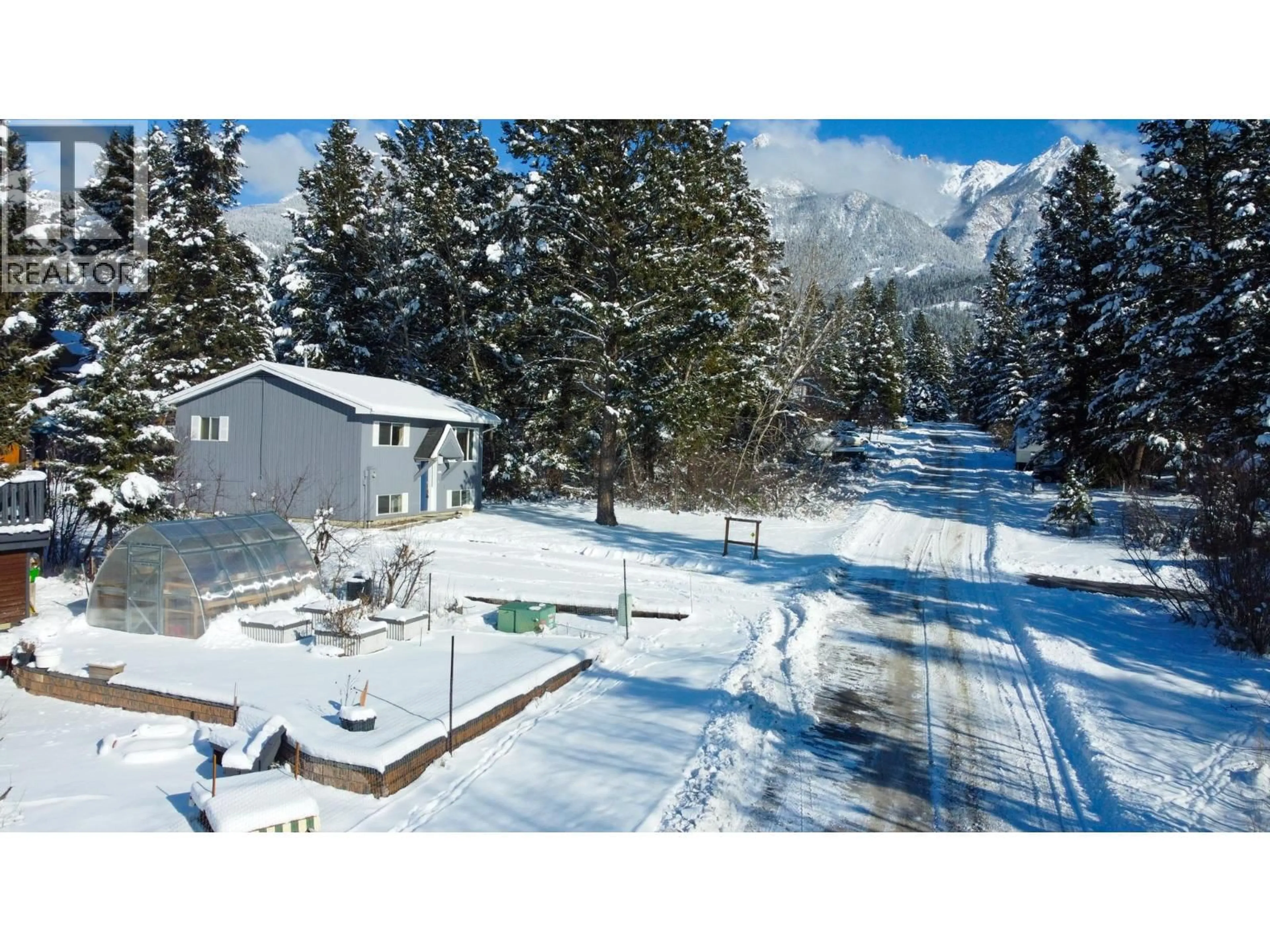 A pic from outside/outdoor area/front of a property/back of a property/a pic from drone, mountain view for 4885 REDWING ROAD, Fairmont Hot Springs British Columbia V0B1L1