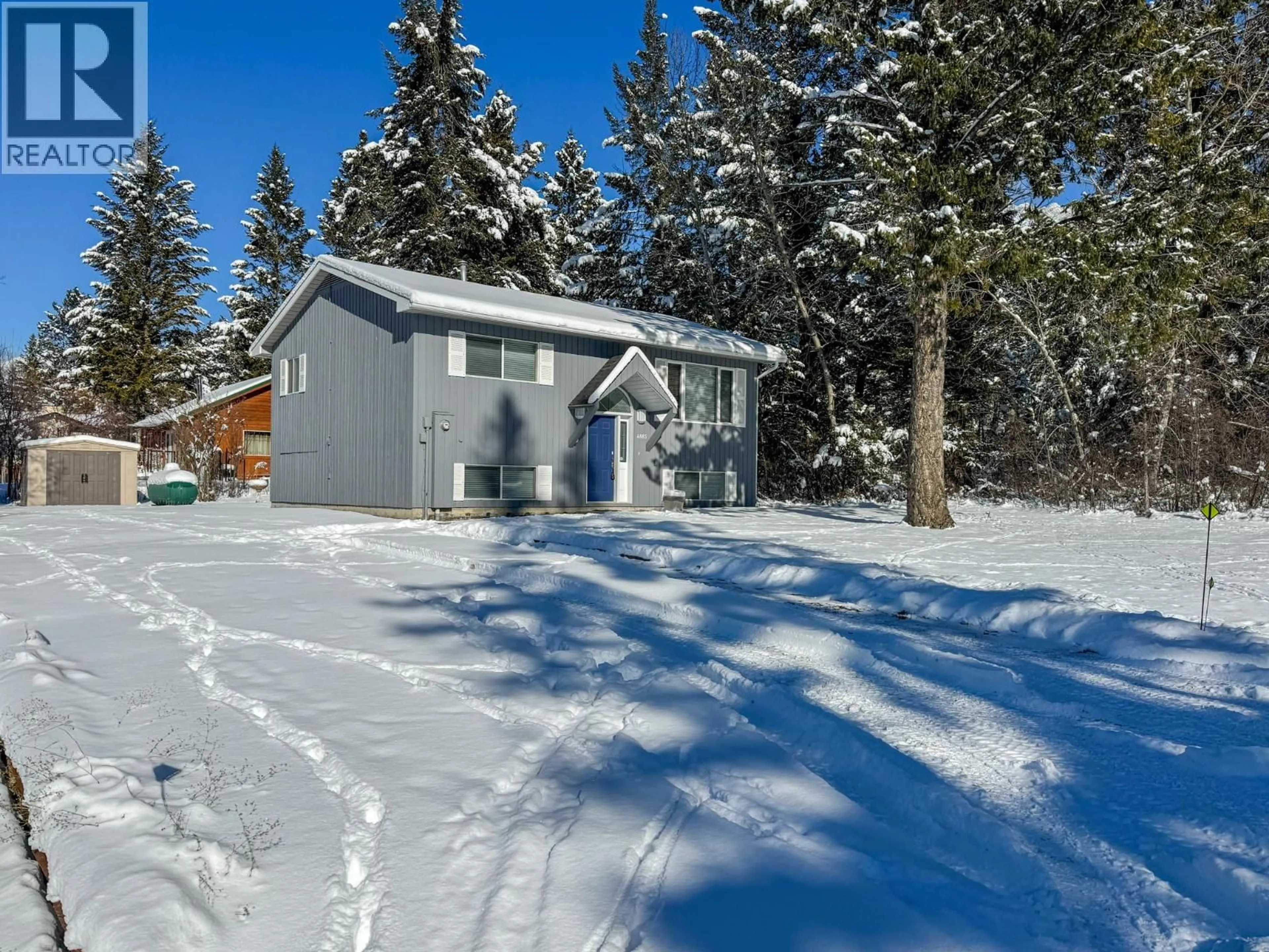 A pic from outside/outdoor area/front of a property/back of a property/a pic from drone, street for 4885 REDWING ROAD, Fairmont Hot Springs British Columbia V0B1L1